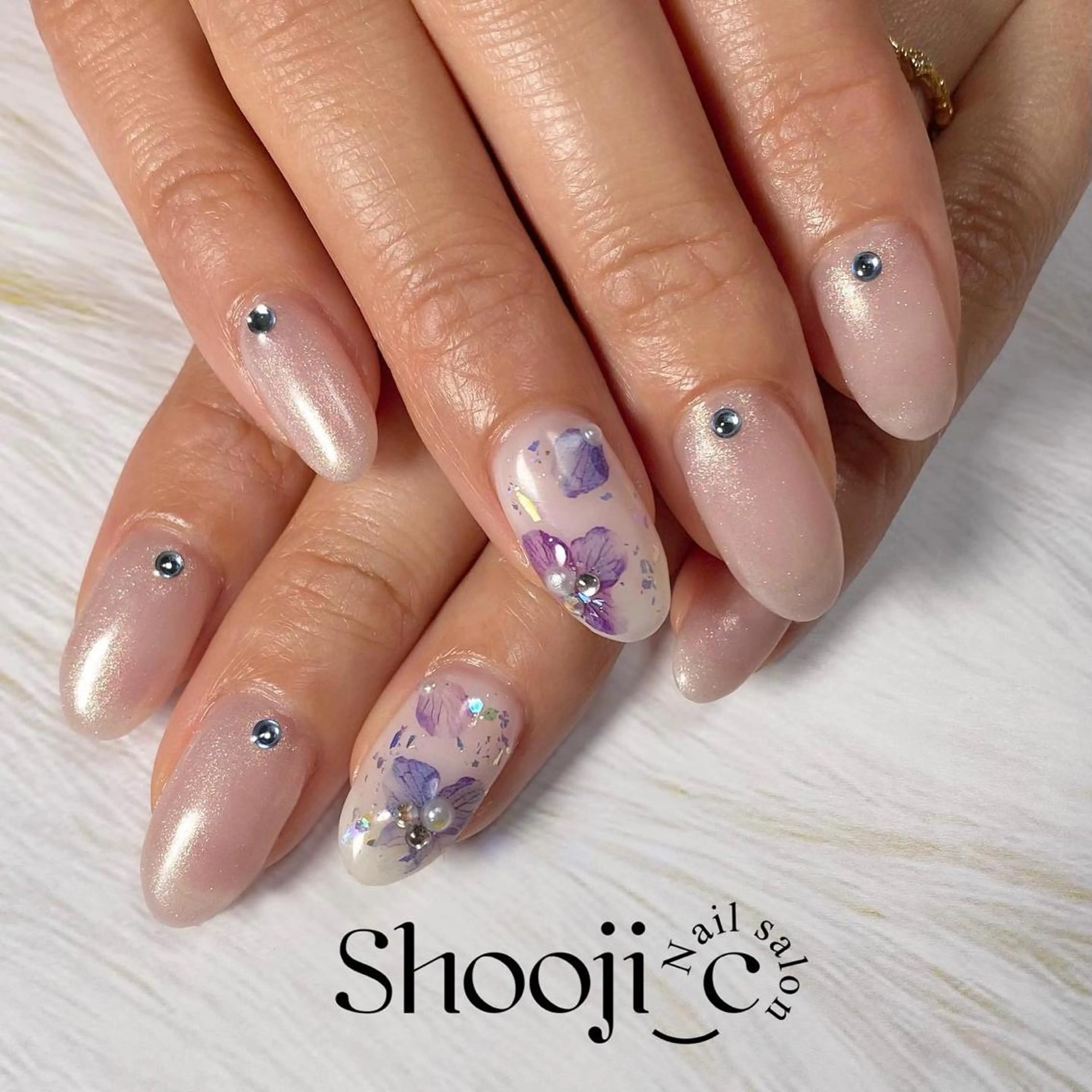 ネイル アートネイル 水色 ストーンネイル ハンドネイル Shooji_c Nail salon所属・Shooji_c Nail salonのネイルデザイン