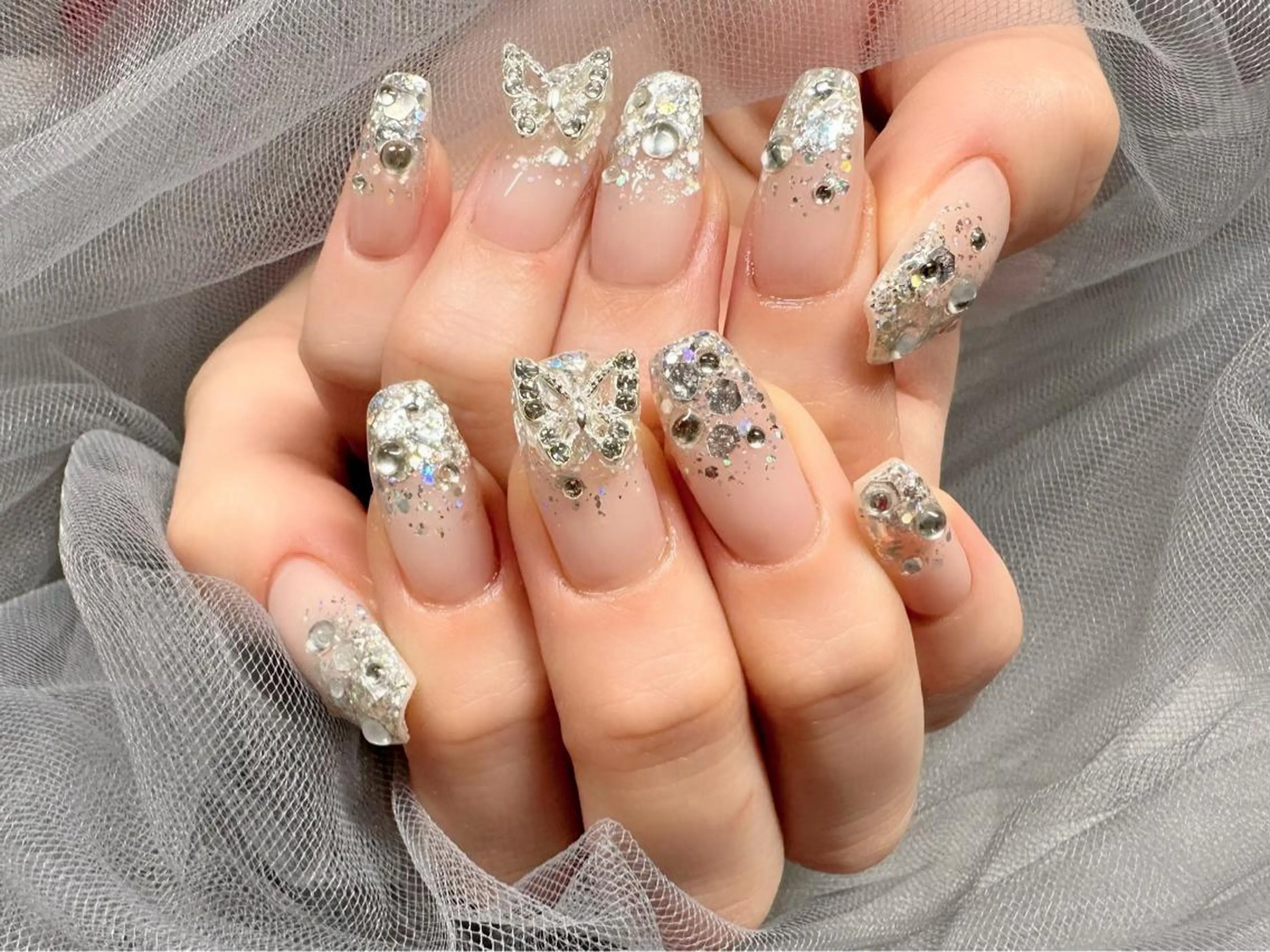 ネイル オーロラネイル キラキラネイル ラメ(グリッター) ラメグラデーション シルバー ハンドネイル KURELLY所属・Nail Salon KURELLYのネイルデザイン