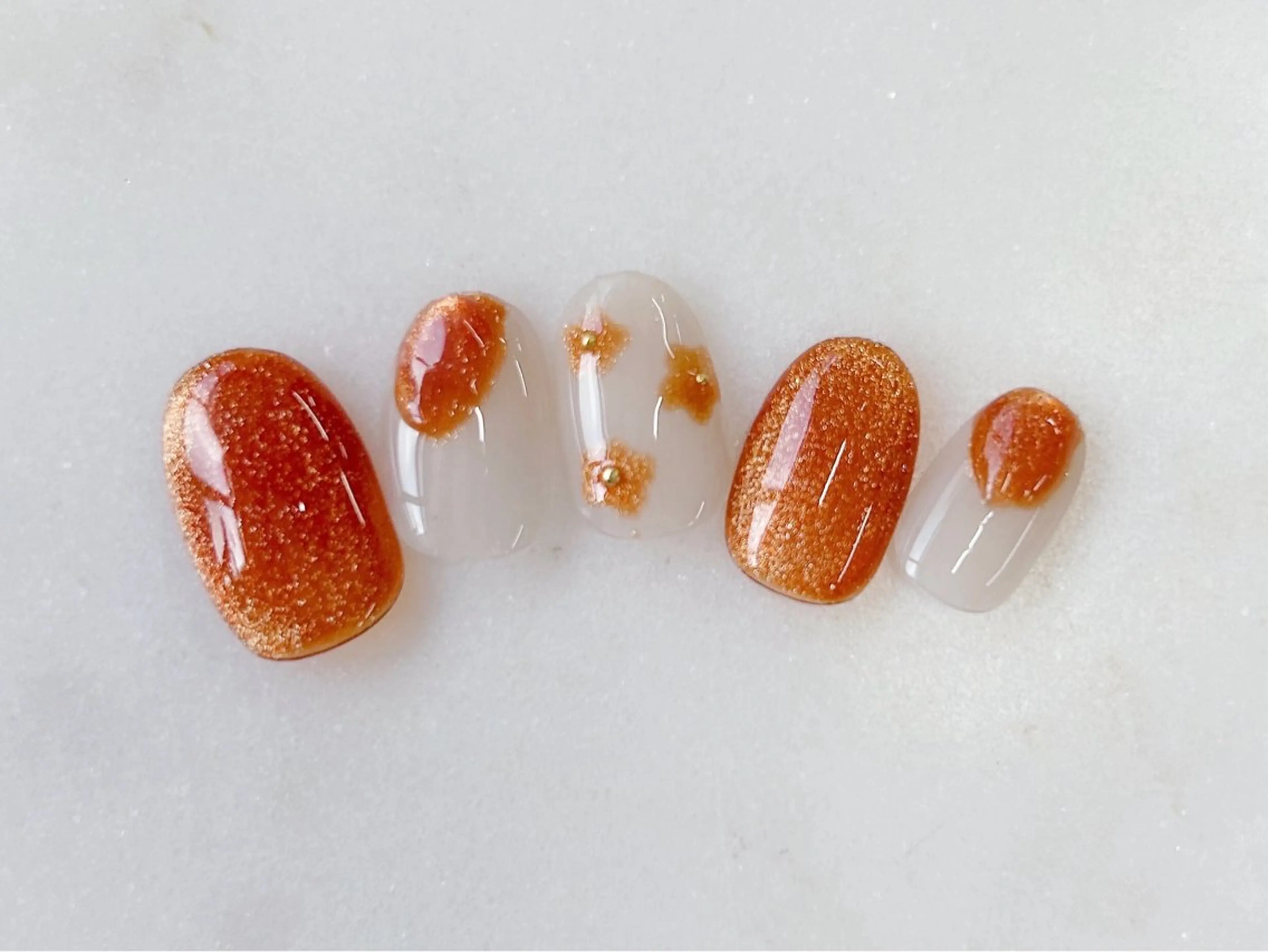 ネイル 桜ネイル フラワーネイル マグネットネイル ニュアンスネイル オレンジ ハンドネイル Forca total studio所属・Forca Airaのネイルデザイン