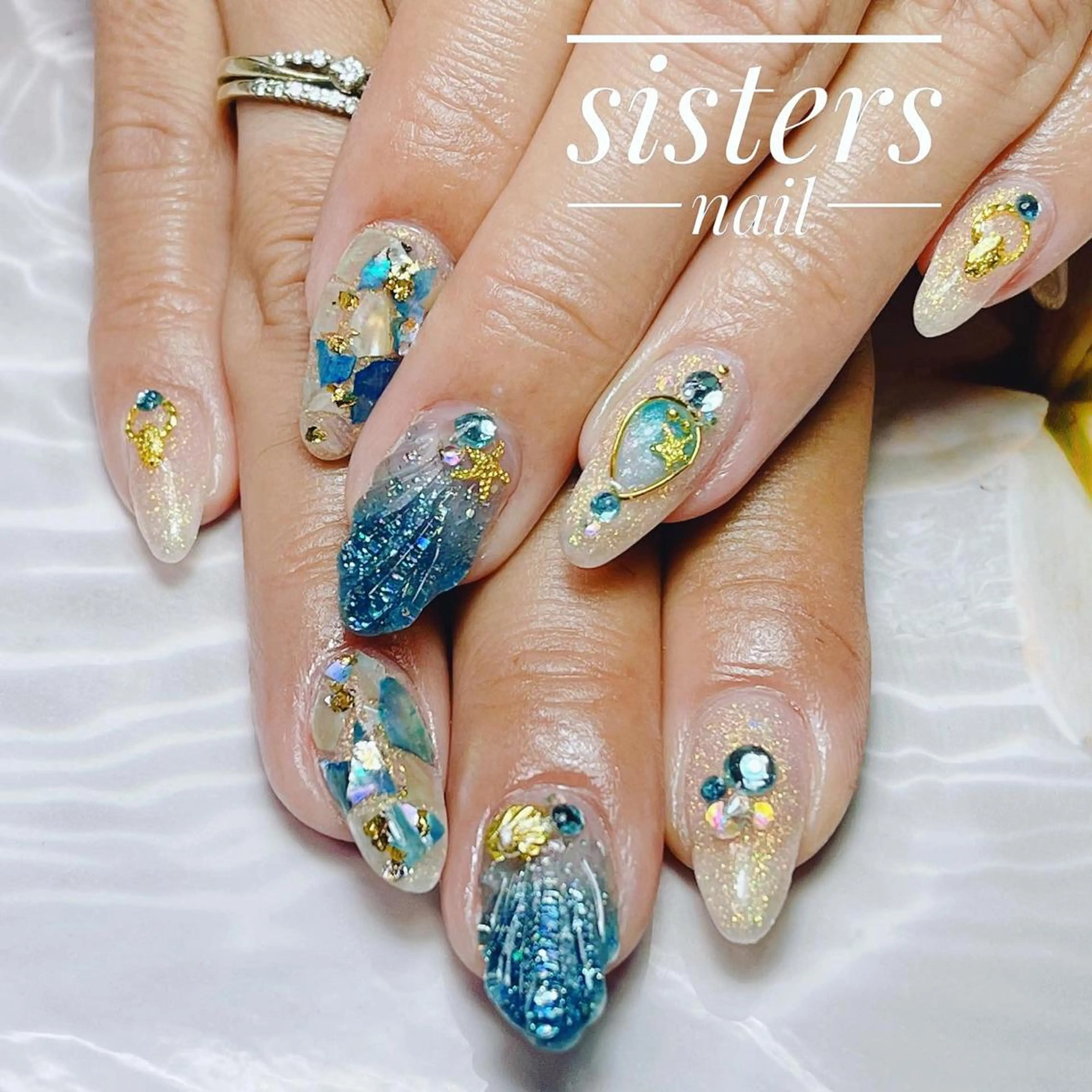 ネイル アートネイル ブルー キラキラネイル 夏ネイル sisters nail.fのネイルデザイン