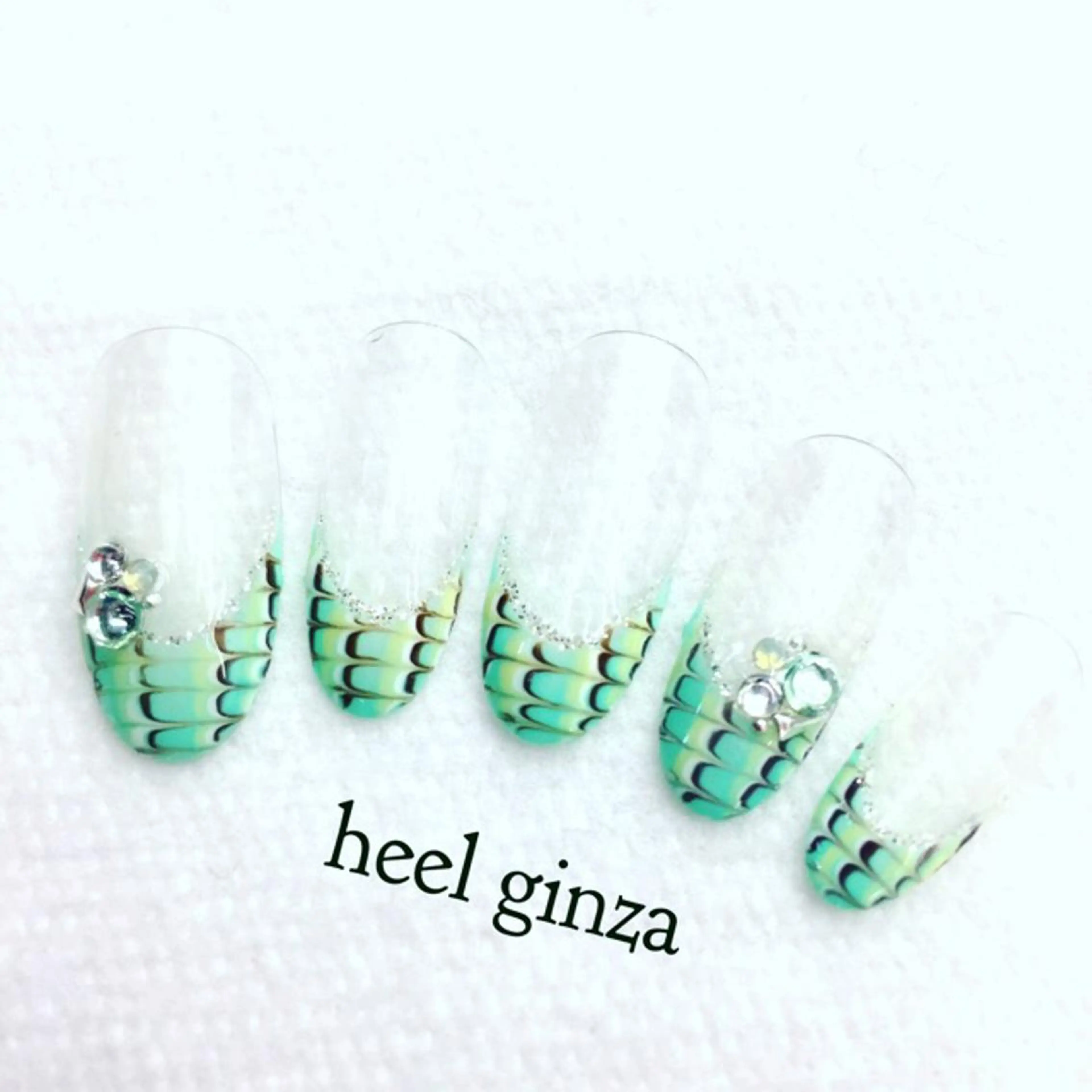 ネイル ピーコックネイル 春ネイル miel nailのネイルデザイン