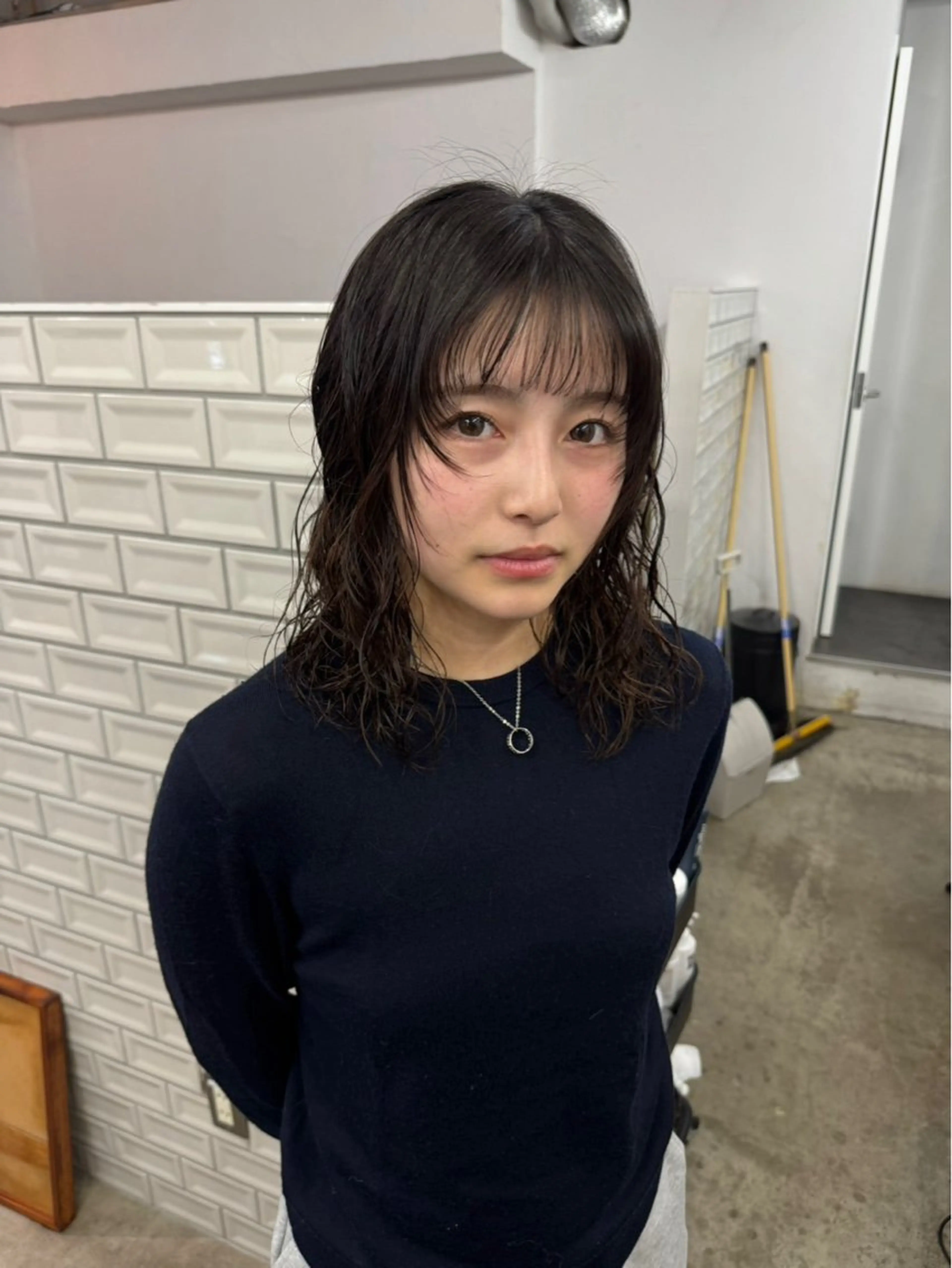 ミディアム パーマ 佐藤 芽衣のヘアスタイル