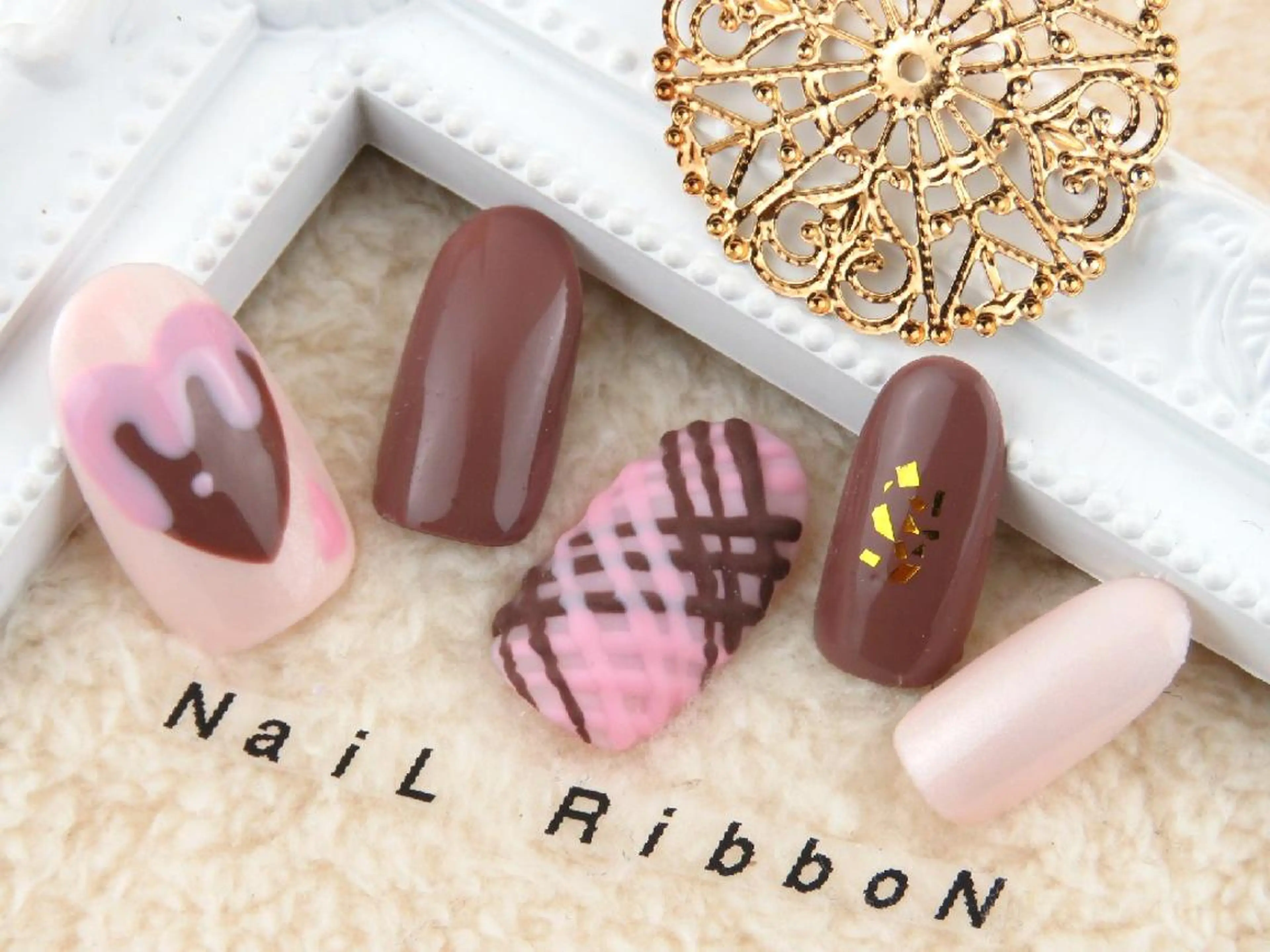 ネイル ネイルリボン 受付スタッフのネイルデザイン