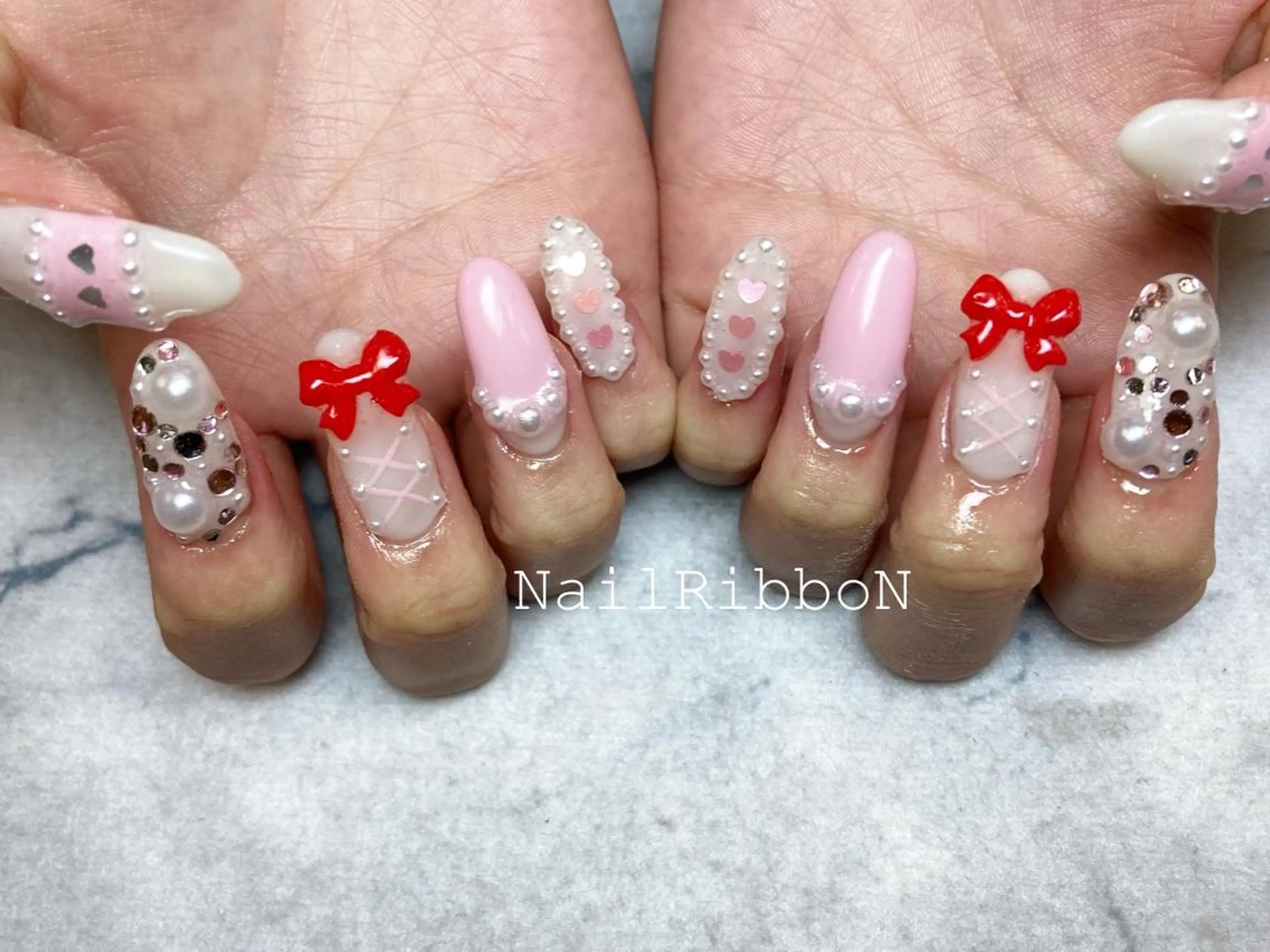 ネイル ネイルリボン 受付スタッフのネイルデザイン