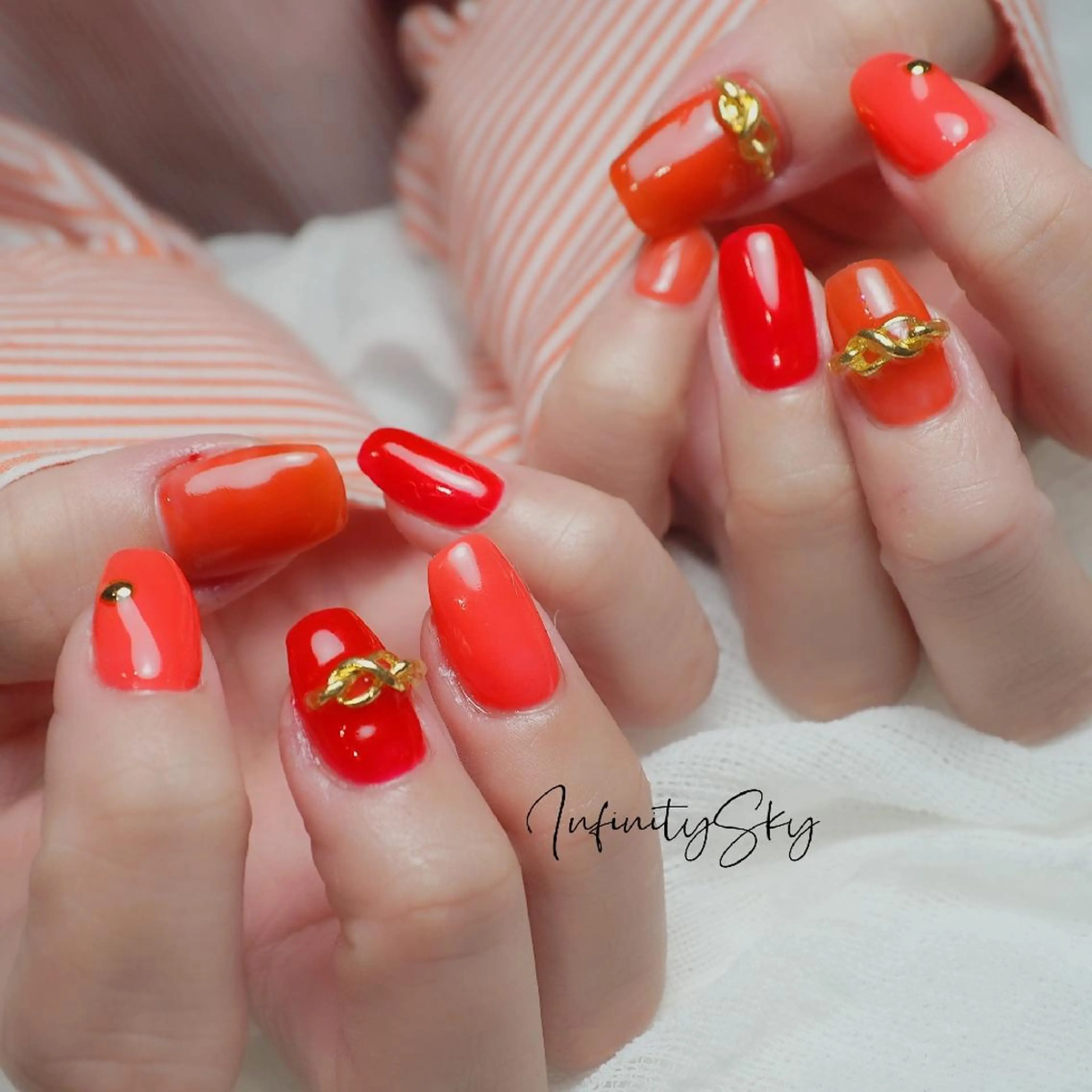 ネイル 赤色 infinity skyのネイルデザイン