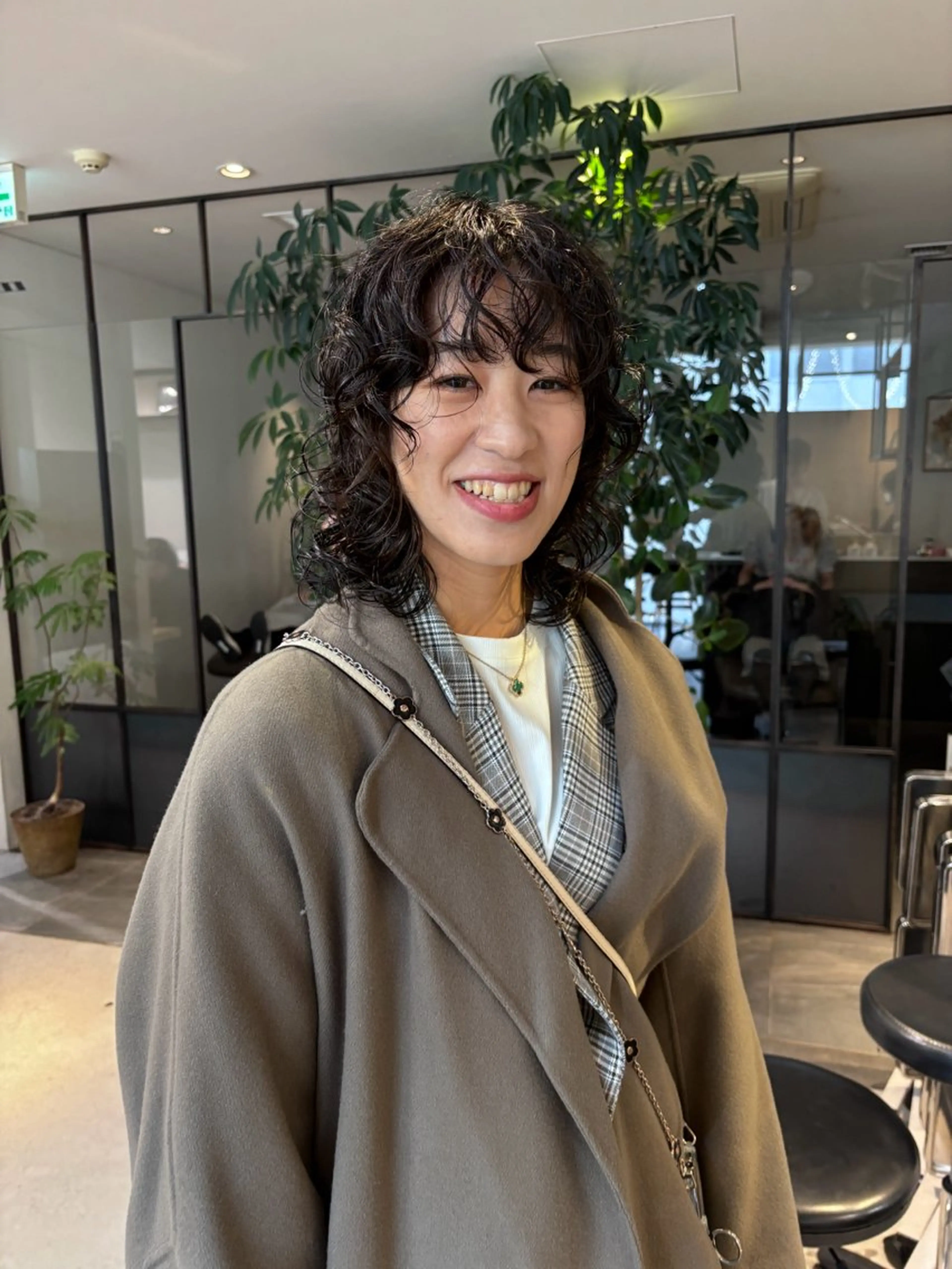 ミディアム パーマ -さたけ たつき-のヘアスタイル