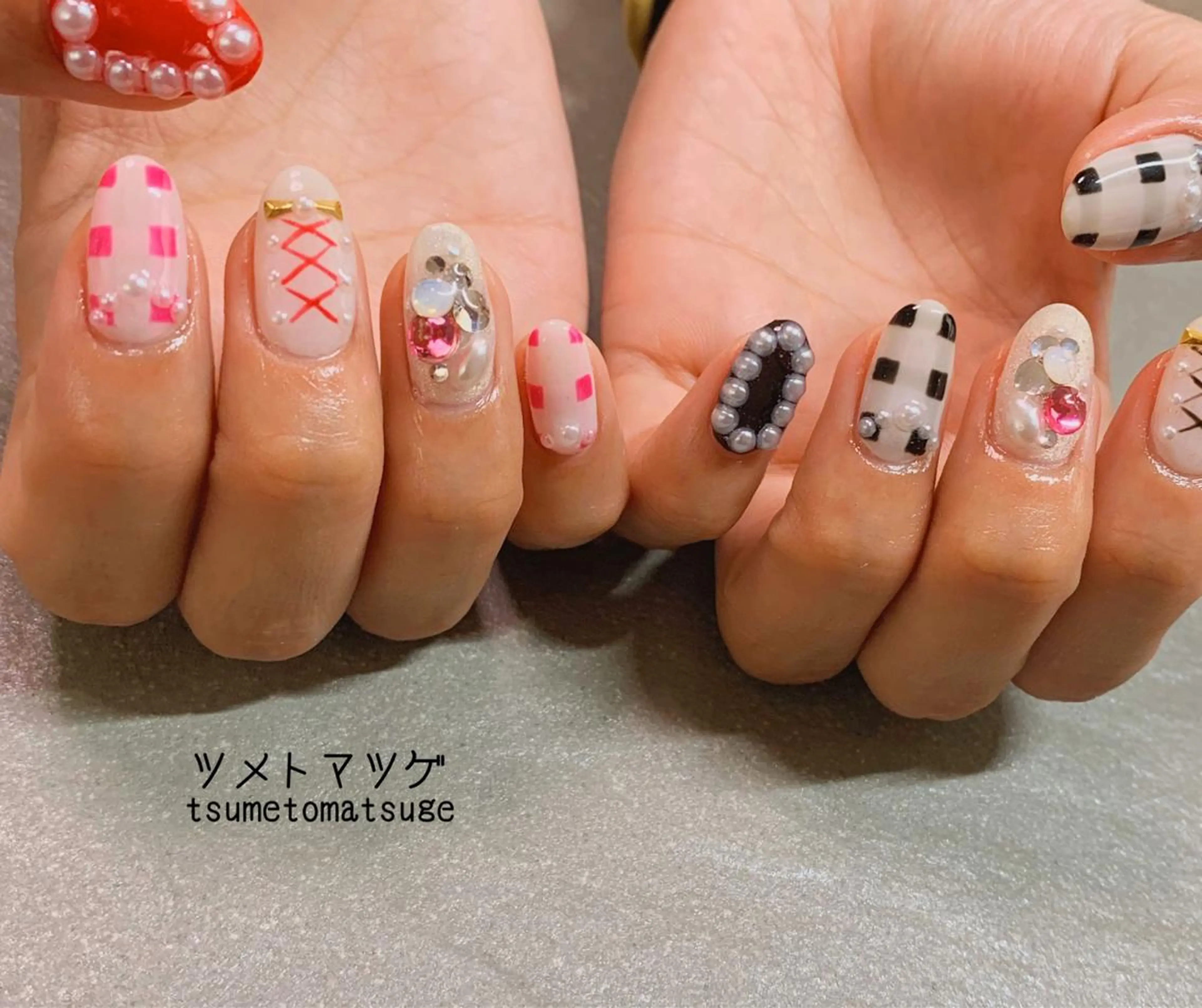 ミディアム ネイル アートネイル ハンドネイル ツメトマツゲ .のネイルデザイン