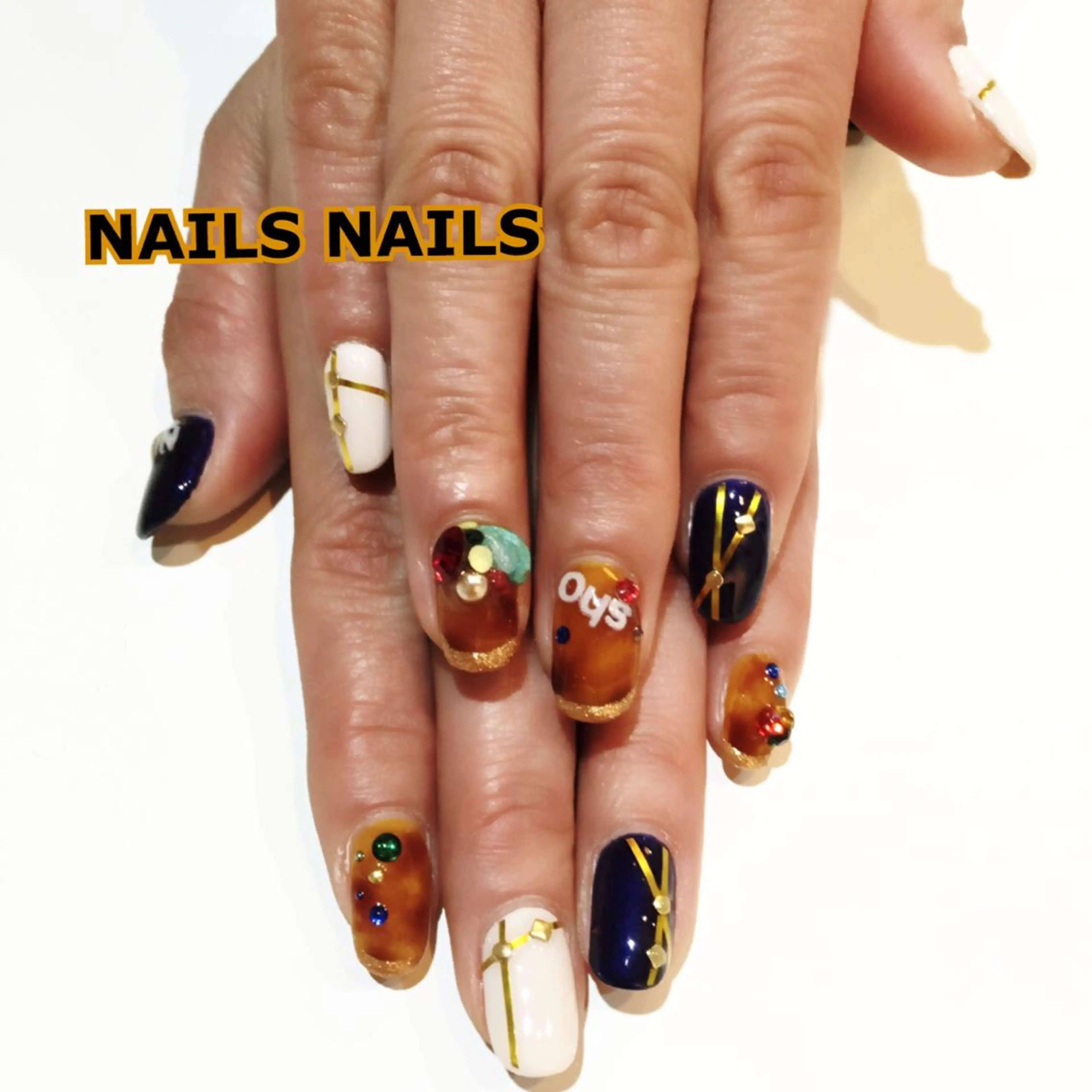 ネイル べっ甲ネイル ゴールド NAILSNAILS ERIKAのネイルデザイン