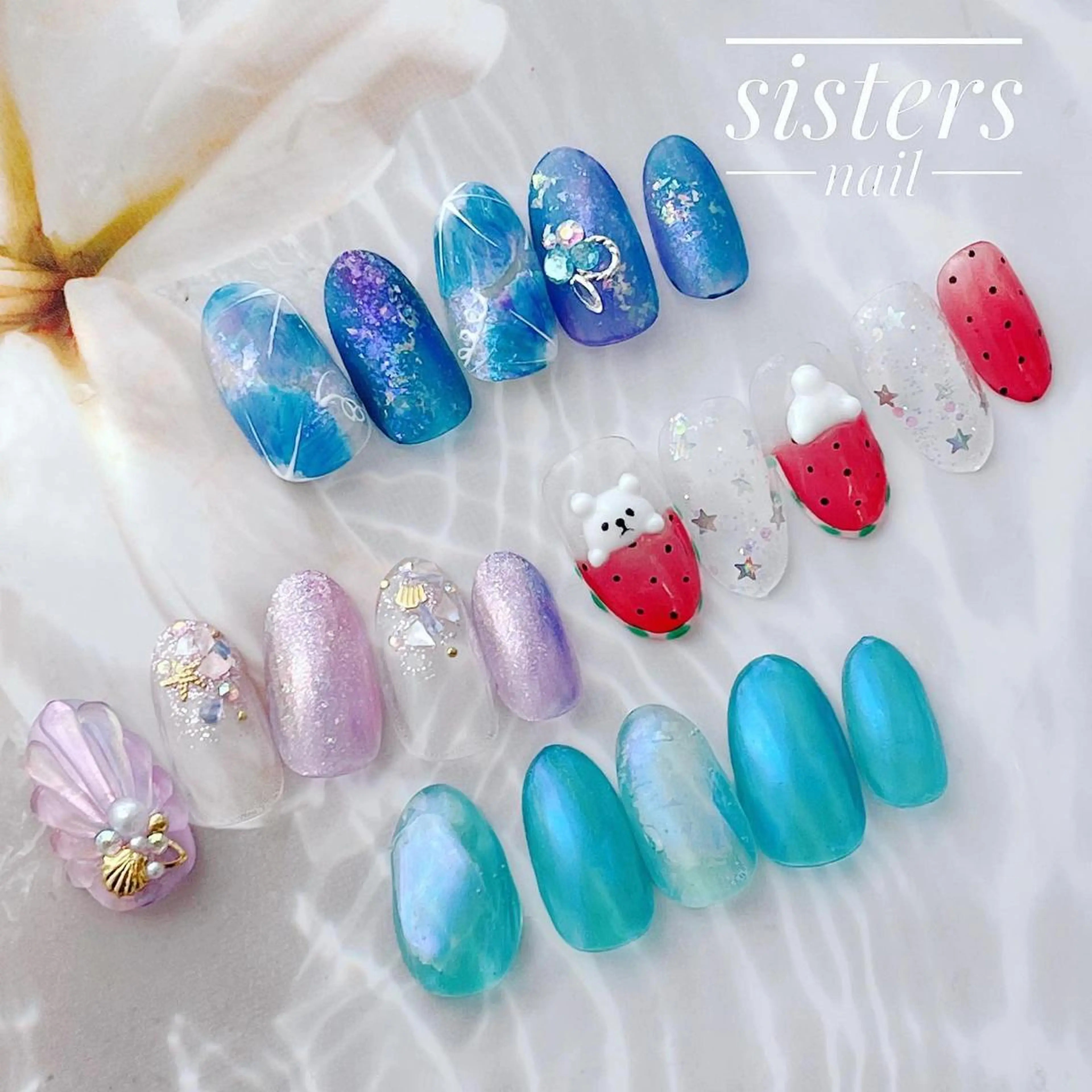 ネイル アートネイル オーロラネイル ブルー フラワーネイル 氷ネイル・うるうるネイル ハンドネイル ハンドケア sisters nail.fのネイルデザイン