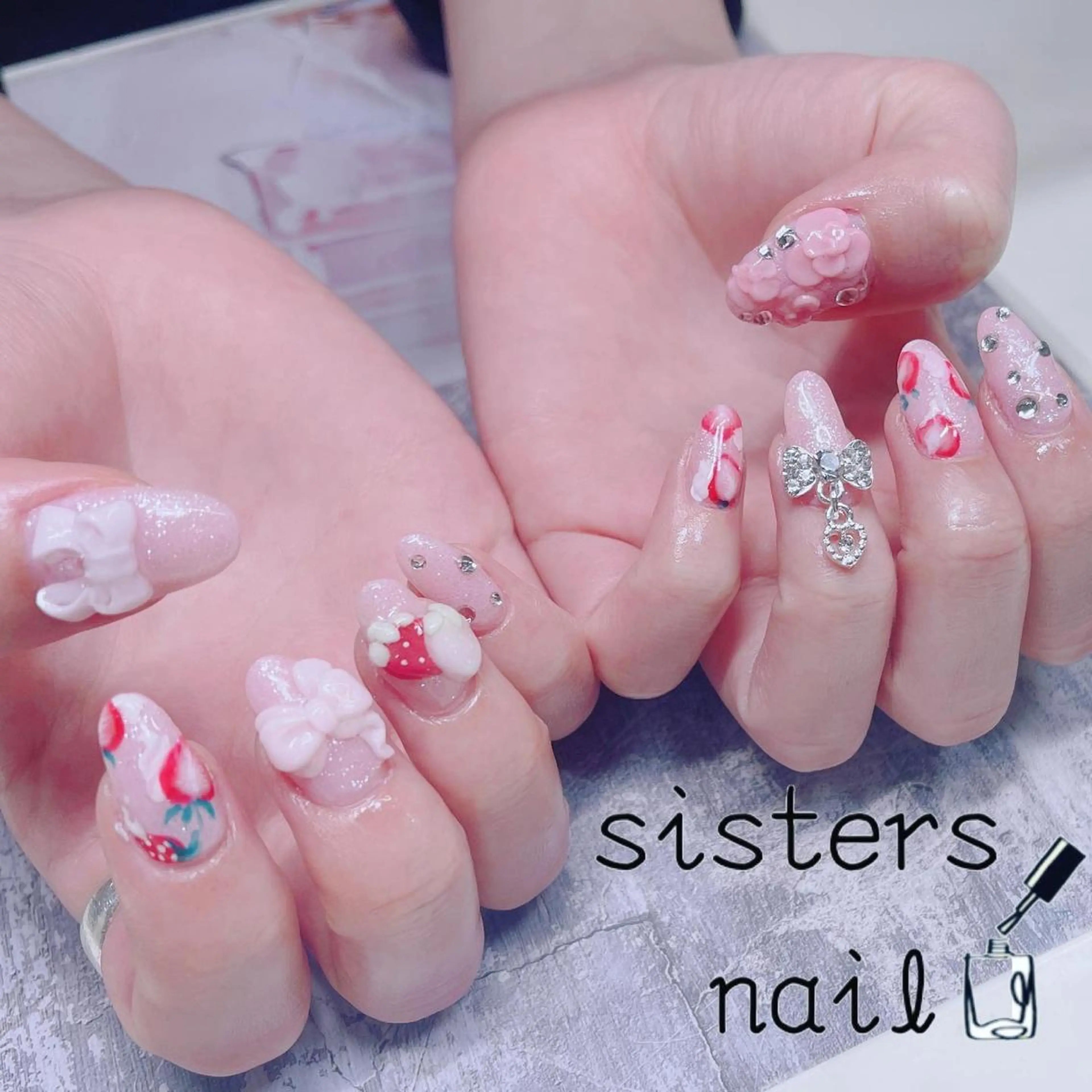 ネイル アートネイル ピンク リボン 春ネイル ハンドネイル ハンドケア sisters nail.fのネイルデザイン
