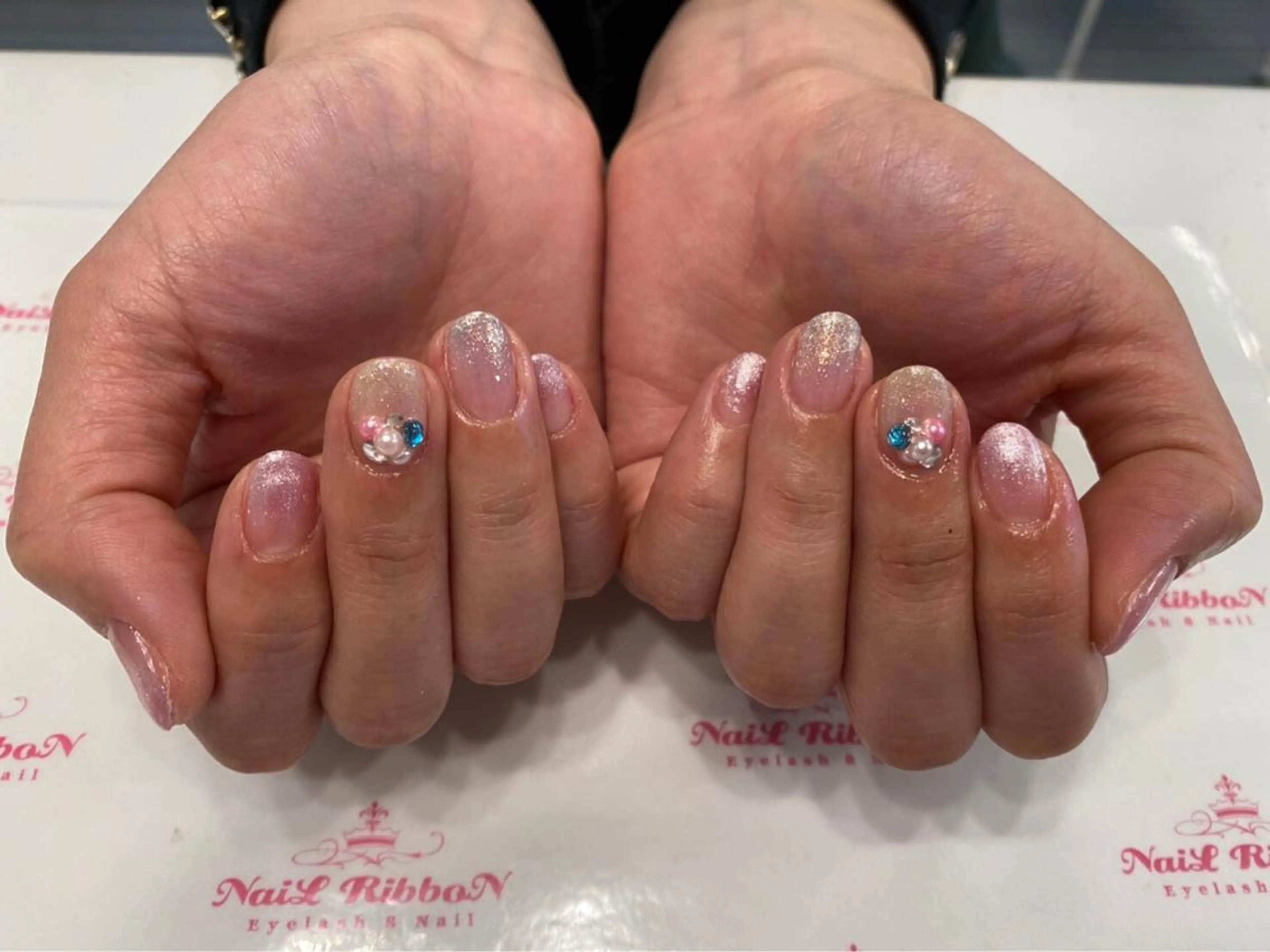 ネイル 春ネイル ネイルリボン 受付スタッフのネイルデザイン