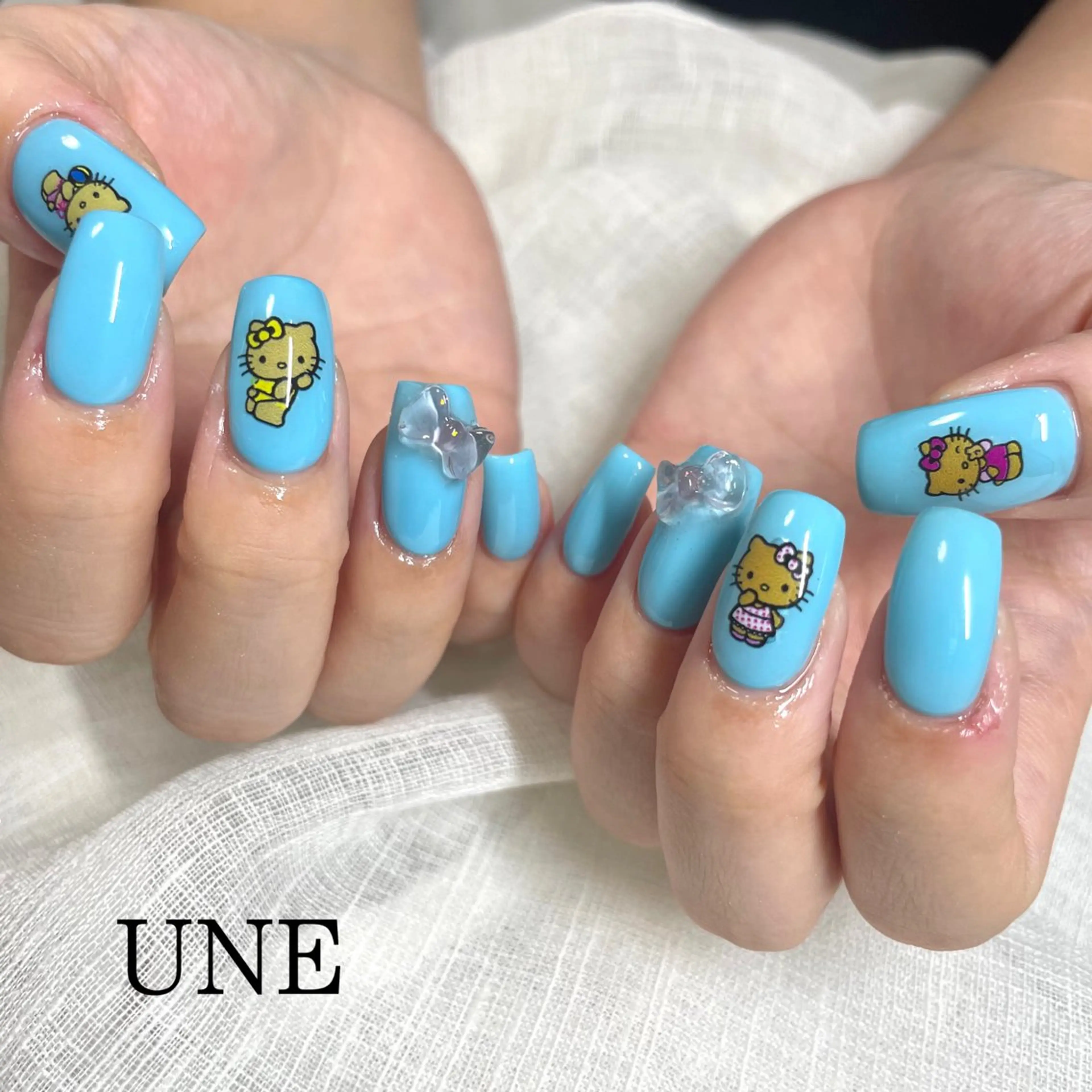ネイル 水色 ワンカラーネイル 夏ネイル UNE.【ユヌ】 Jr.NANAのネイルデザイン