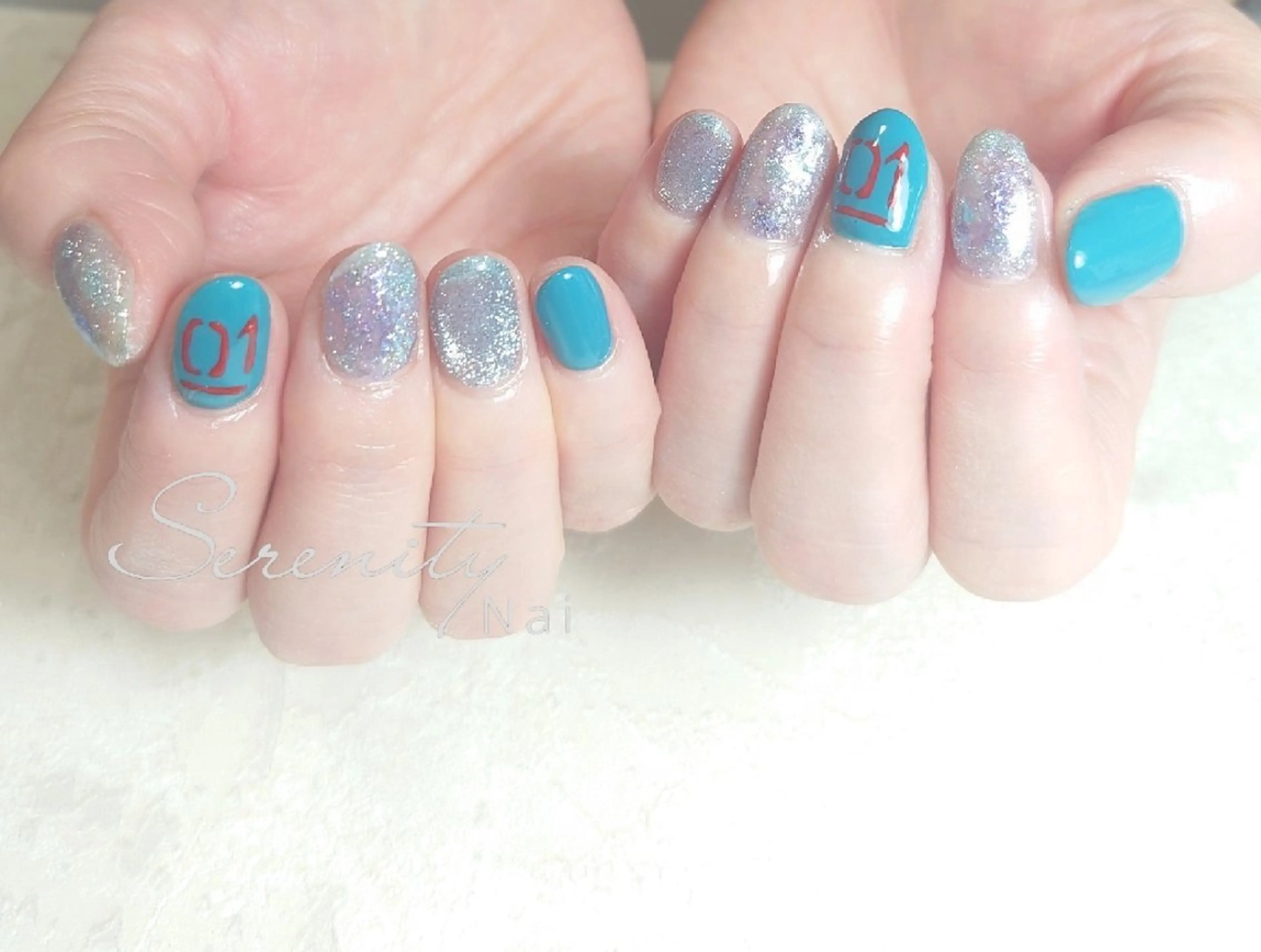 ネイル ブルー フラッシュネイル グリーン キラキラネイル nail  serenityのネイルデザイン