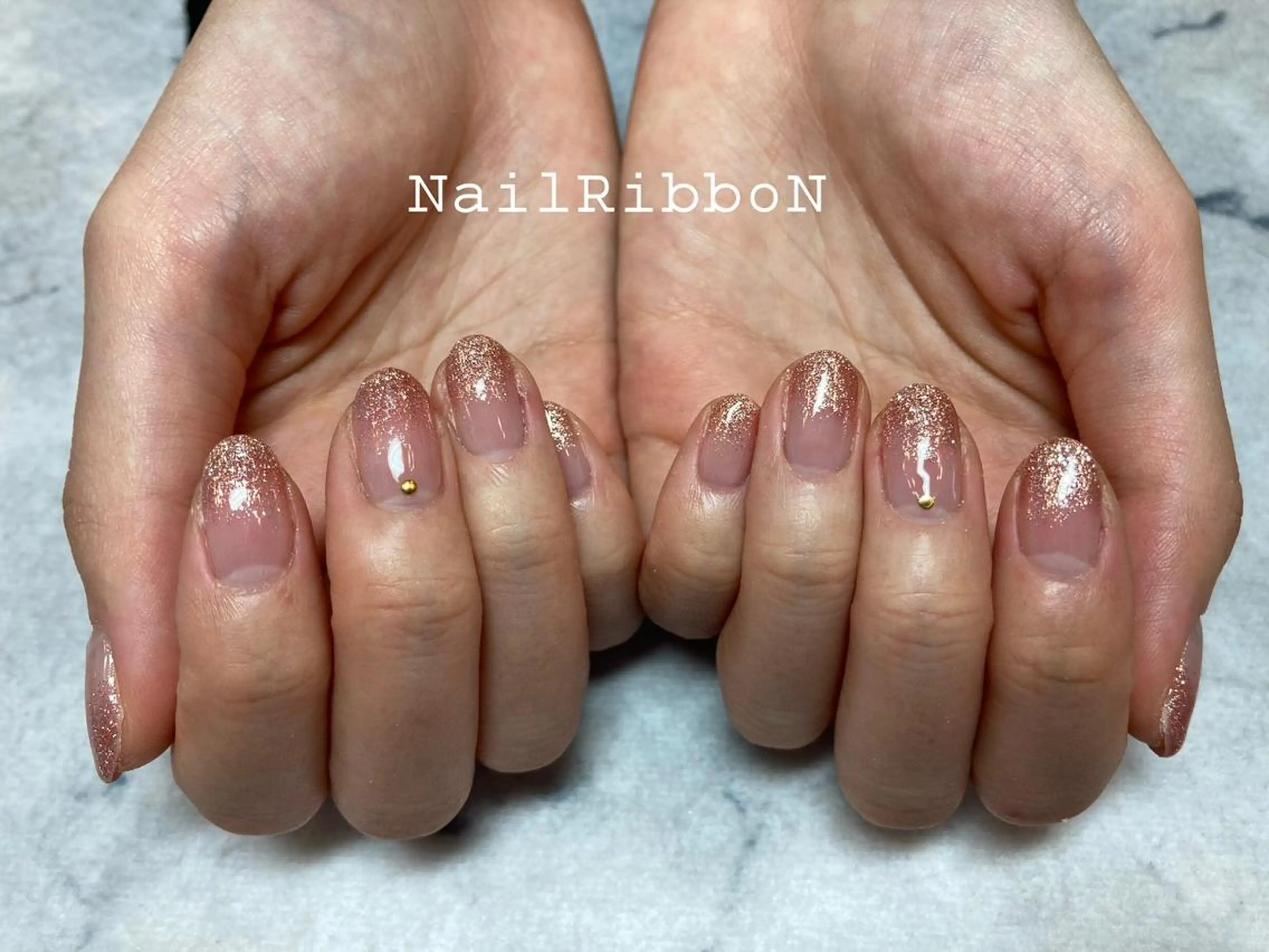 ネイル ネイルリボン 受付スタッフのネイルデザイン