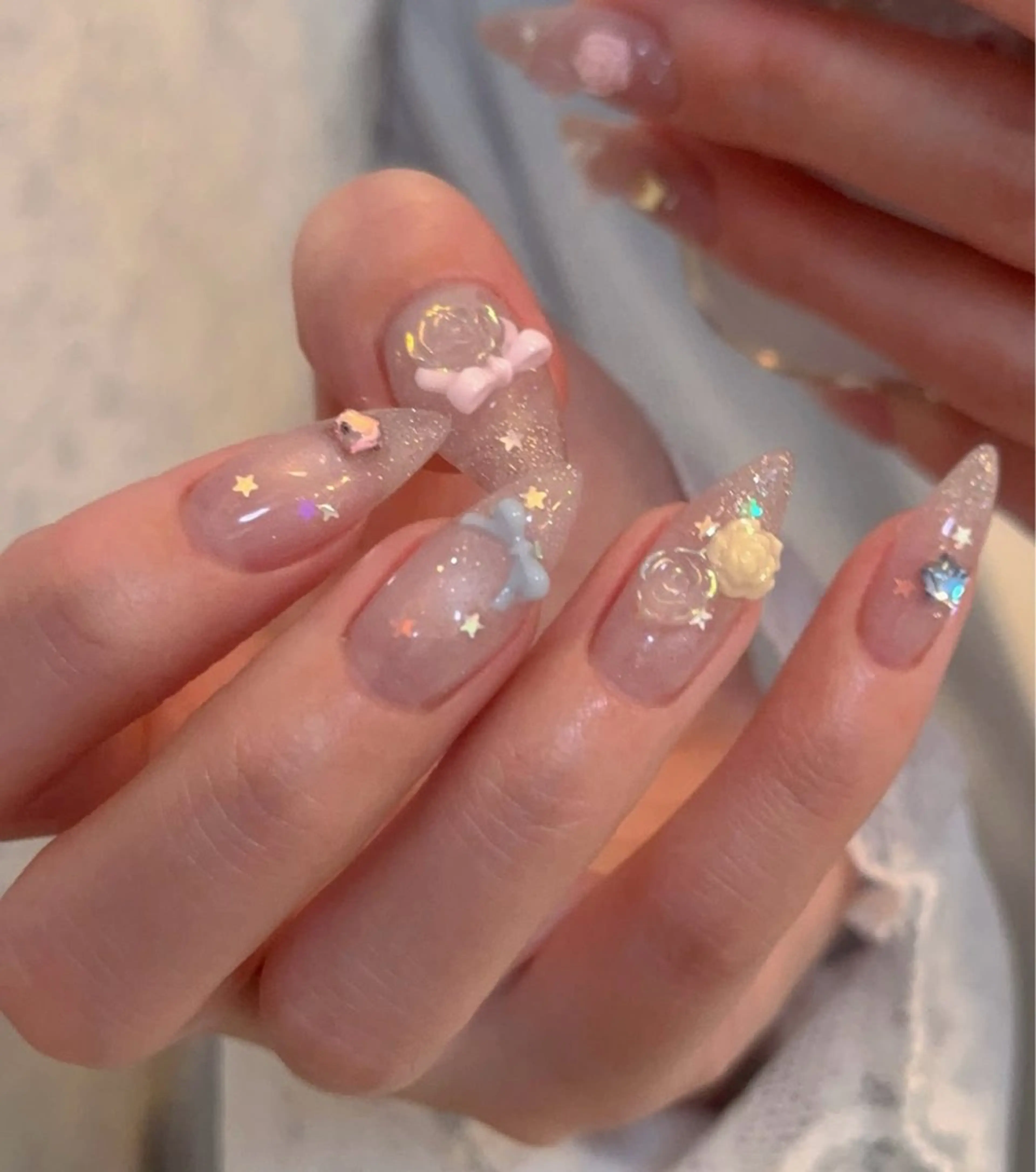 ネイル ガーリー キラキラネイル リボン ハンドネイル BERA NAILSのネイルデザイン