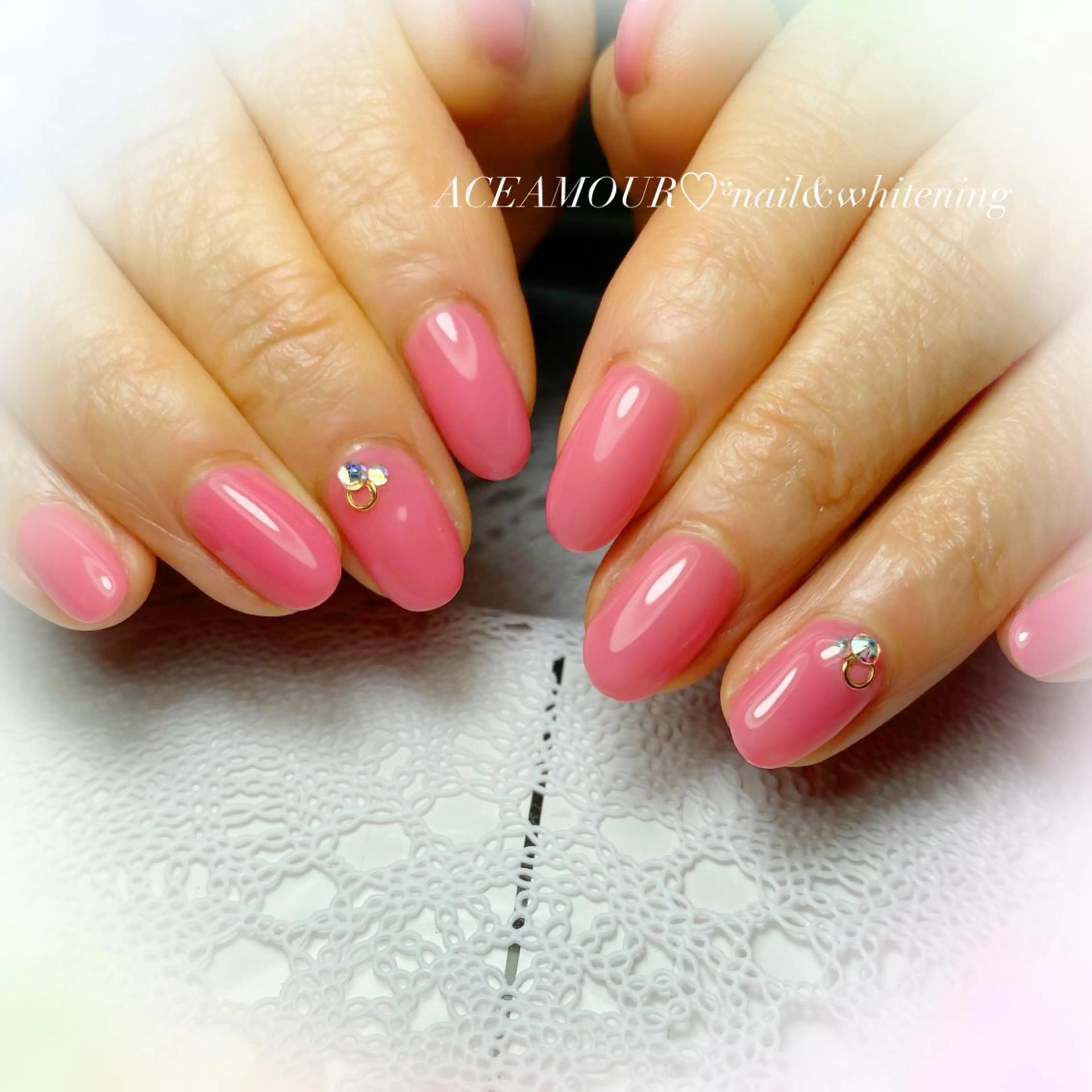 ネイル クリアネイル ワンカラーネイル ピンク 春ネイル ストーンネイル ネイル/耳つぼ /新ホワイトニングのネイルデザイン