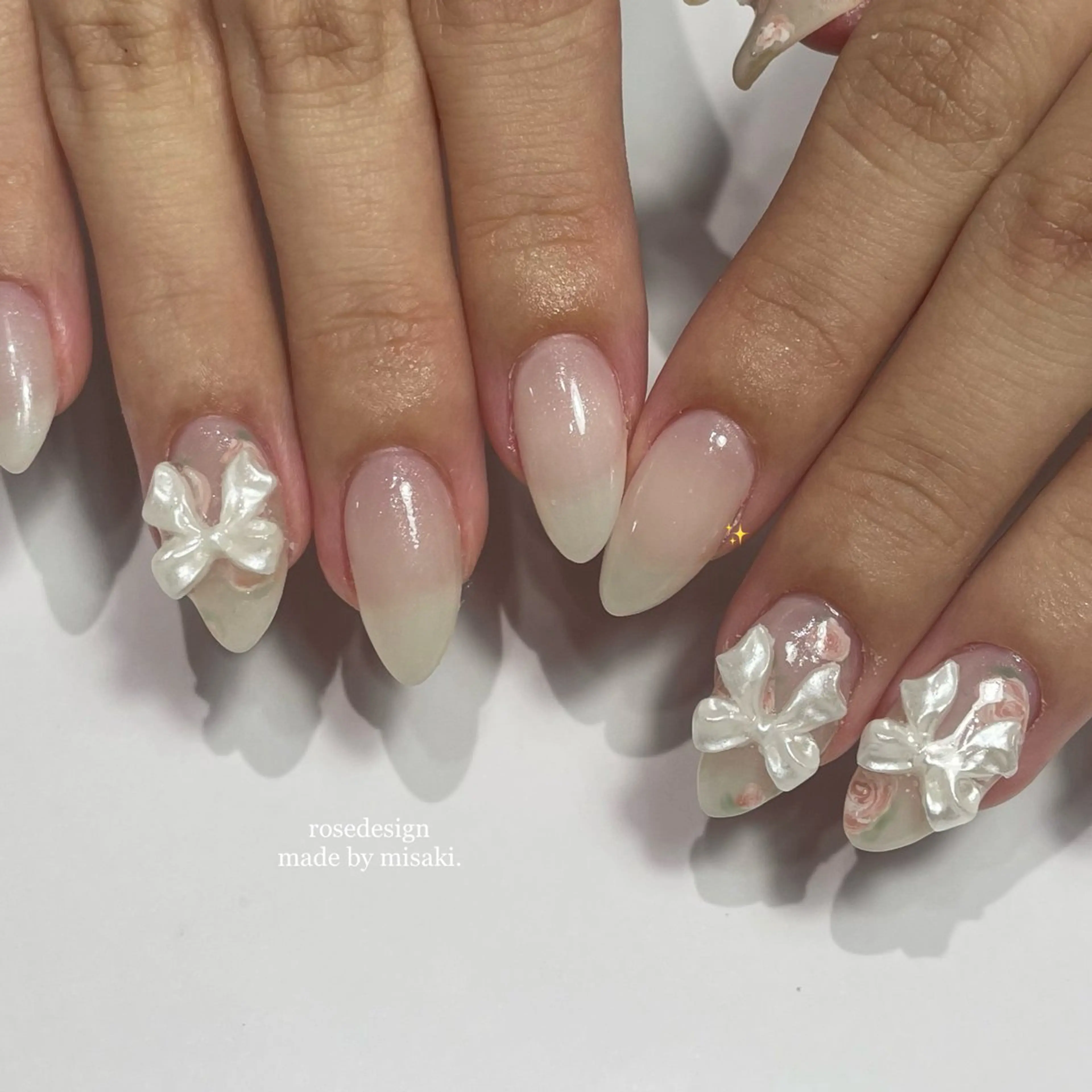 ネイル リボン ハンドネイル 🤍One MISAKI🤍のネイルデザイン
