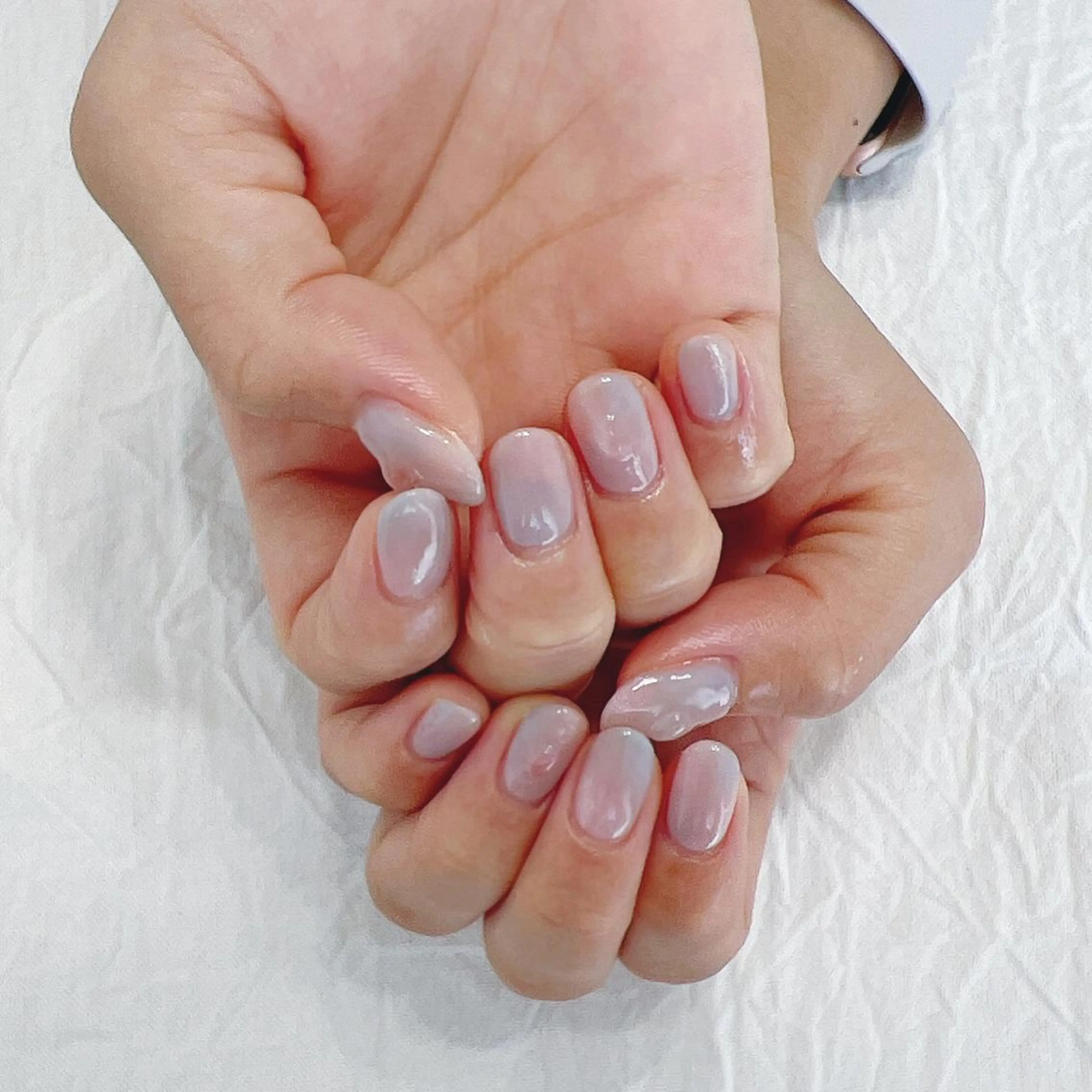 ネイル オーロラネイル キラキラネイル 水色 ピンク シンプルネイル ハンドネイル peaberry nailのネイルデザイン