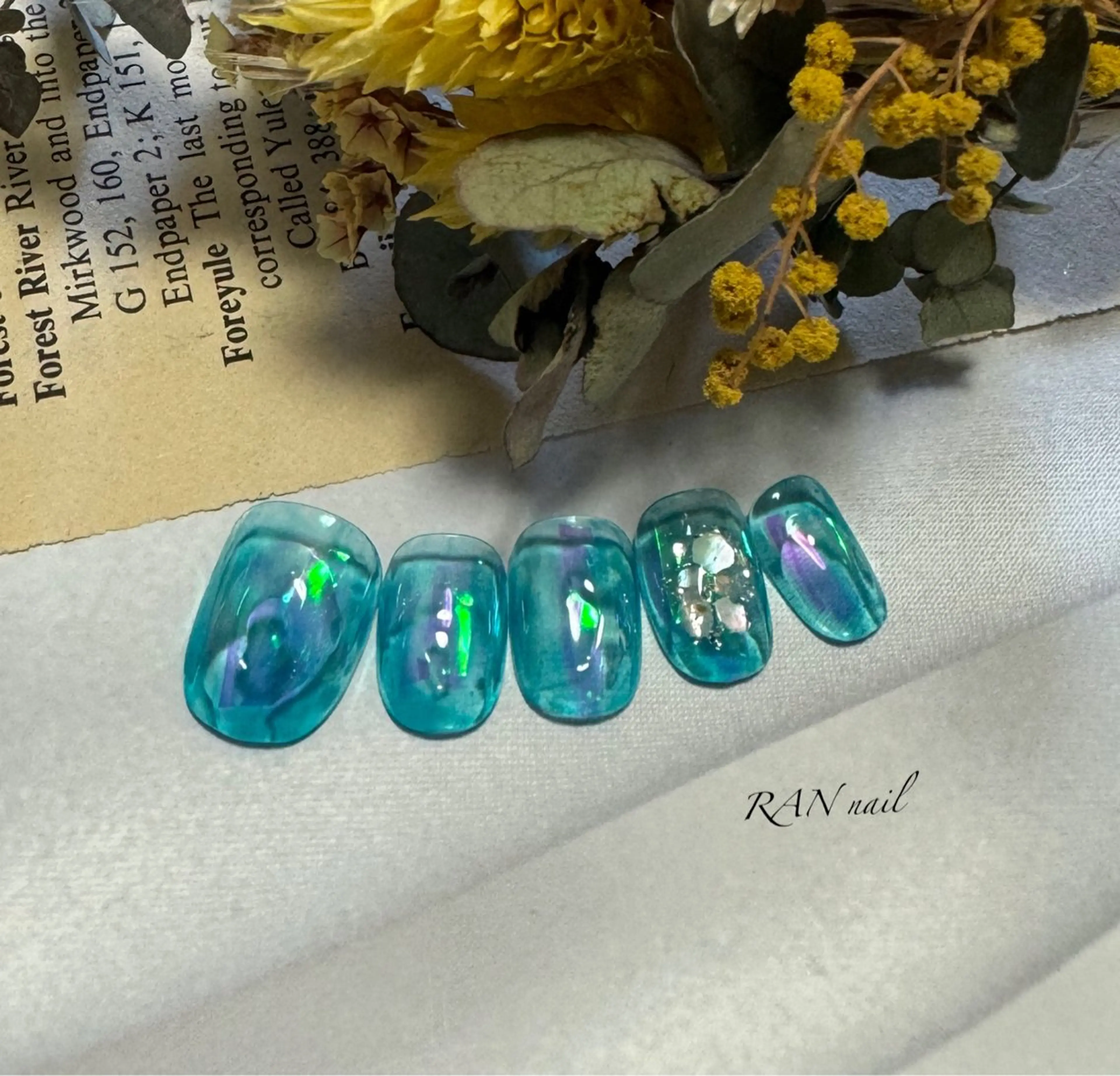 ネイル オーロラネイル ブルー クリアネイル 氷ネイル・うるうるネイル キラキラネイル ハンドネイル フットネイル RAN nail 〜ランネイル〜所属・RAN nailのネイルデザイン