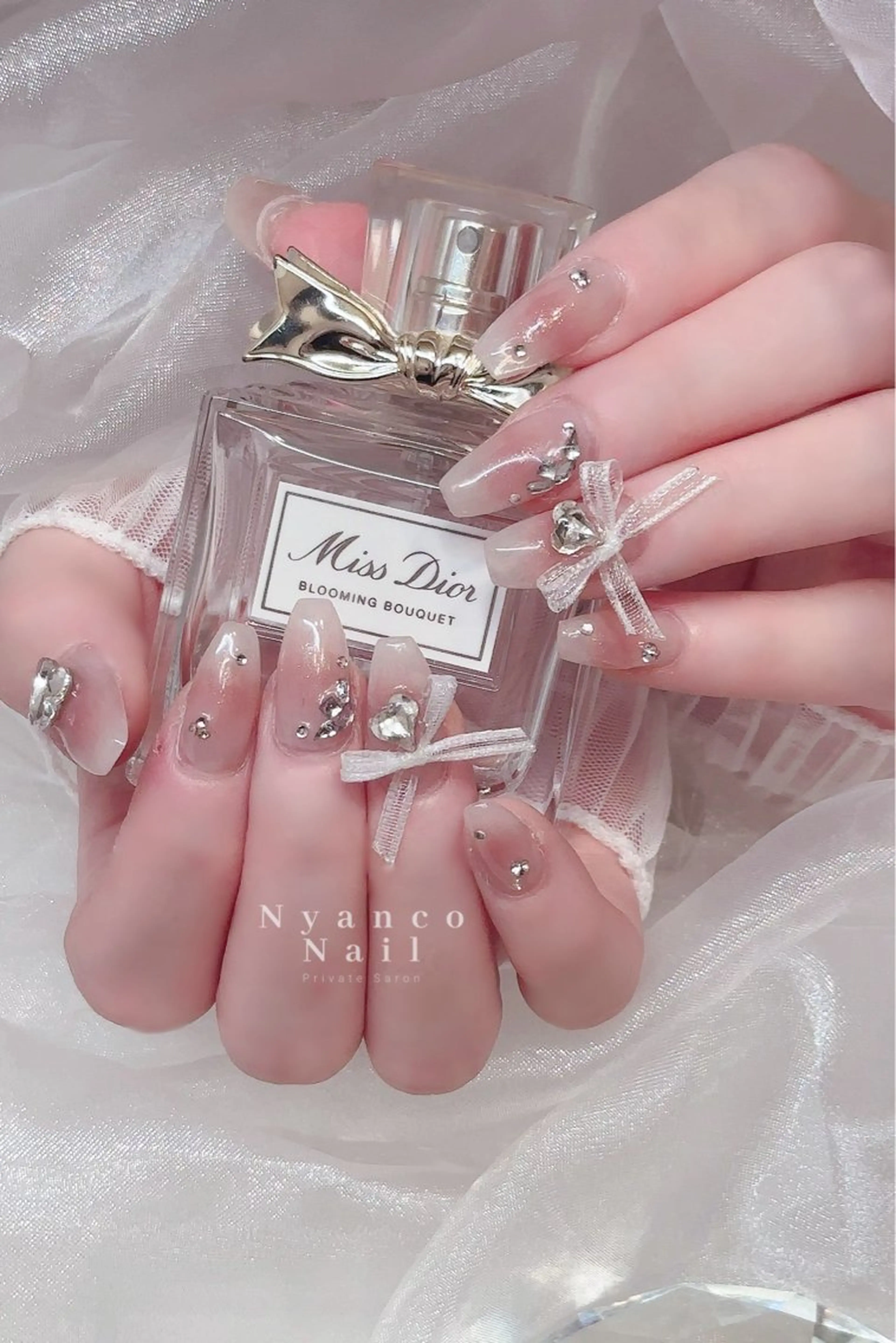 ネイル チークネイル ジェルネイル キラキラネイル ラメ(グリッター) ロングネイル Nyanco Nailのネイルデザイン