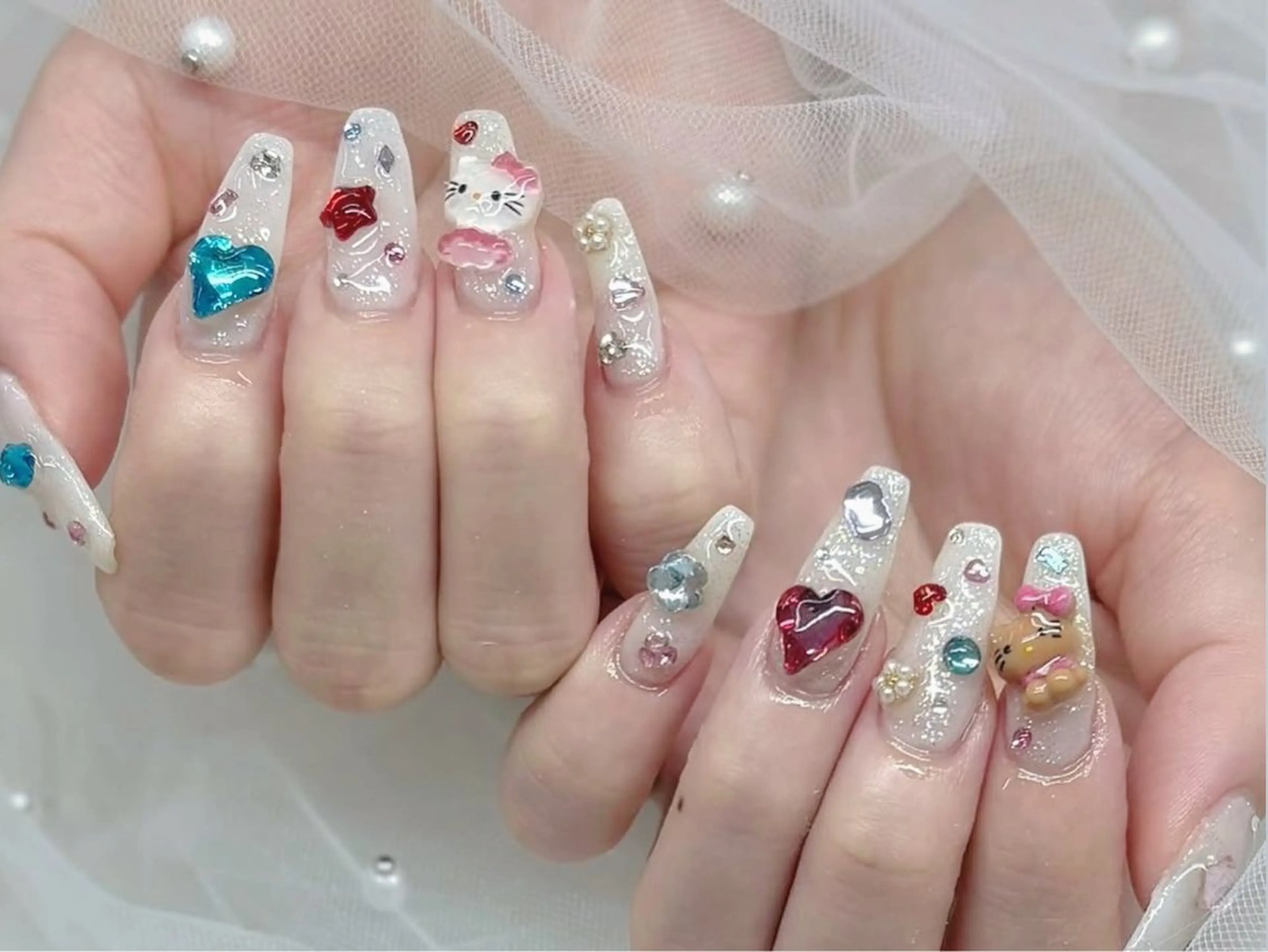 ロング 韓国風ヘア ハンドネイル NOA NAILのネイルデザイン