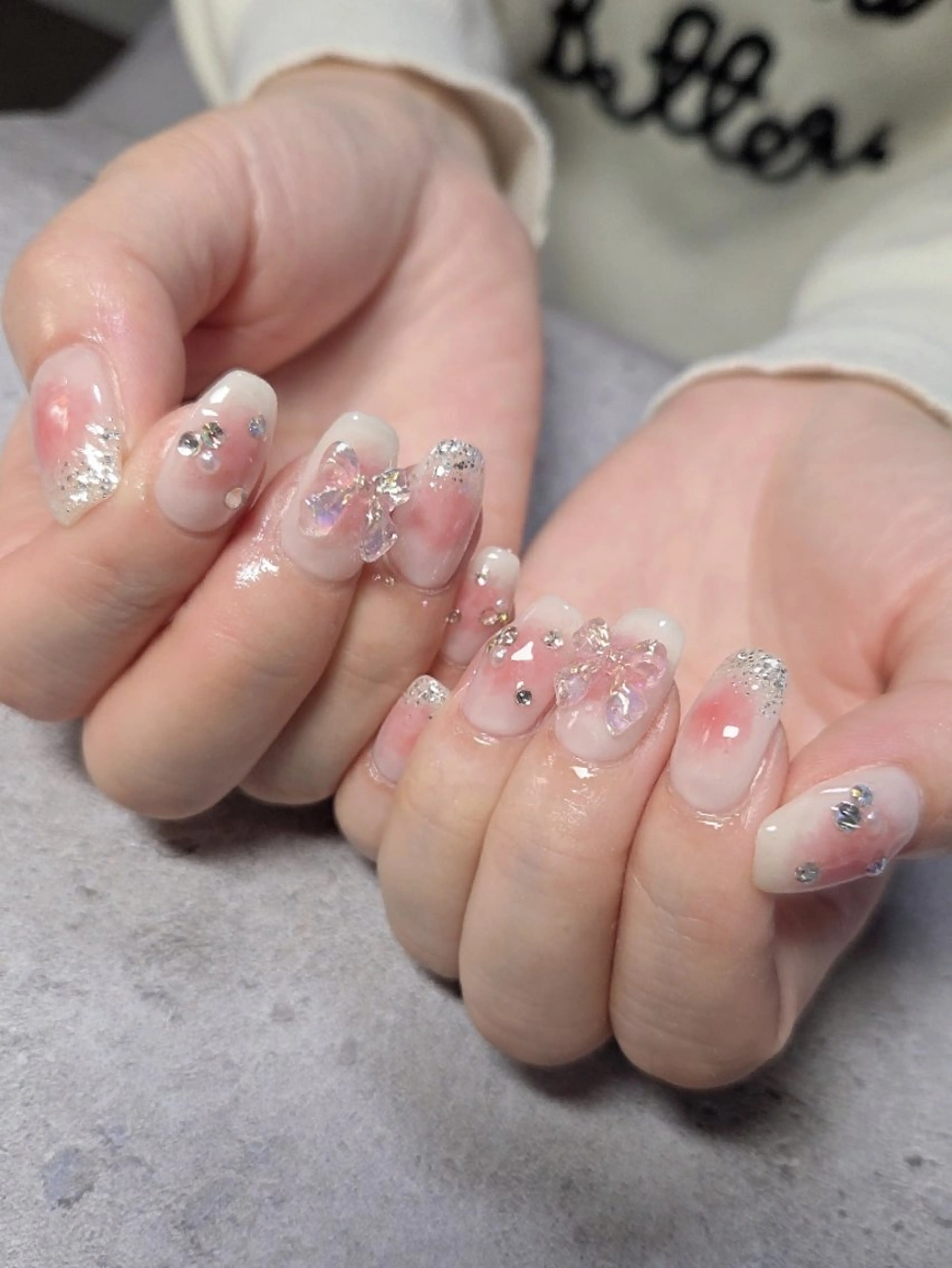 ネイル チークネイル フラワーネイル キラキラネイル ぷっくりネイル リボン ハンドネイル flure de neige yukiのネイルデザイン