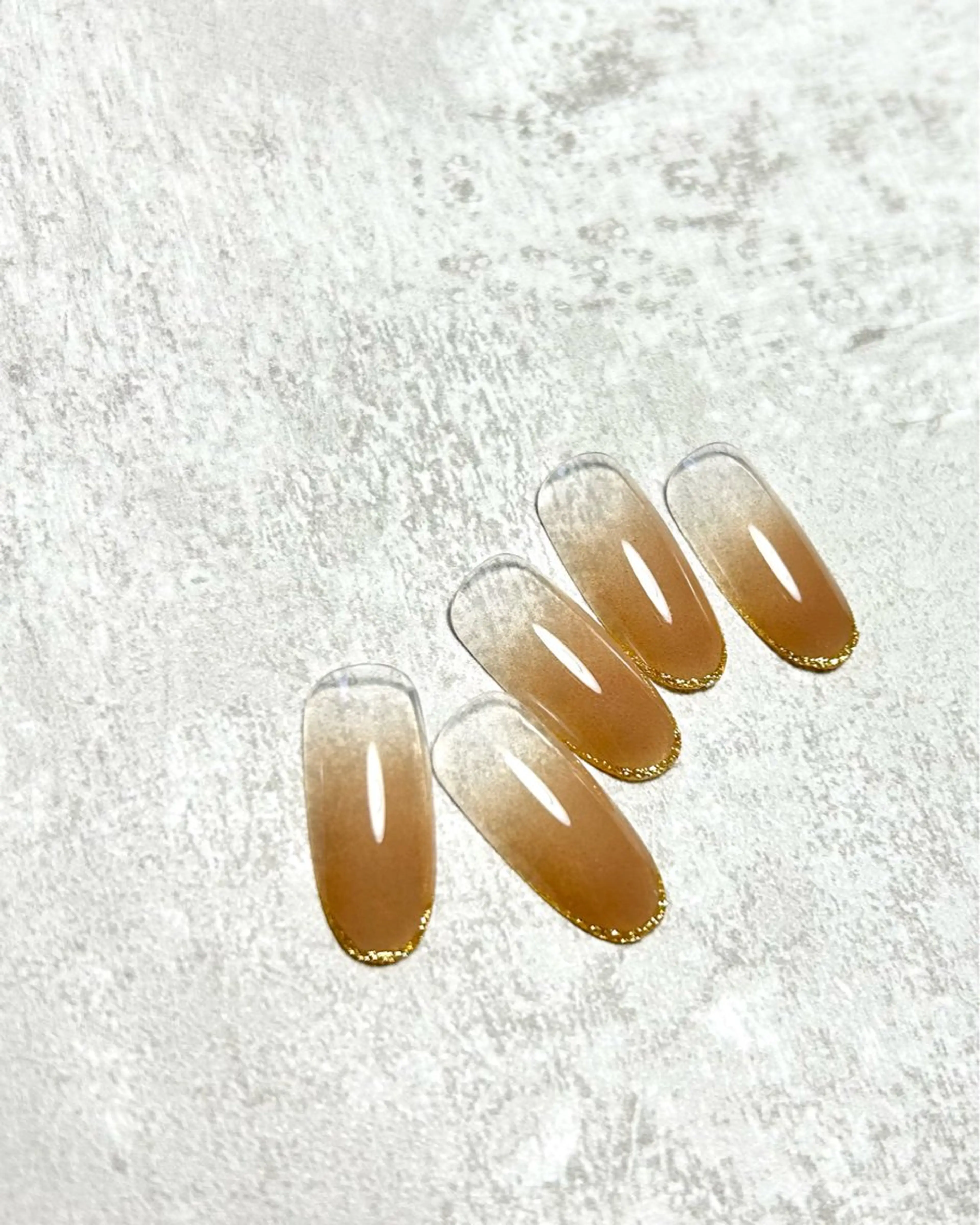 ネイル ジェルネイル グラデーション ラメ(グリッター) UN. nailsのネイルデザイン