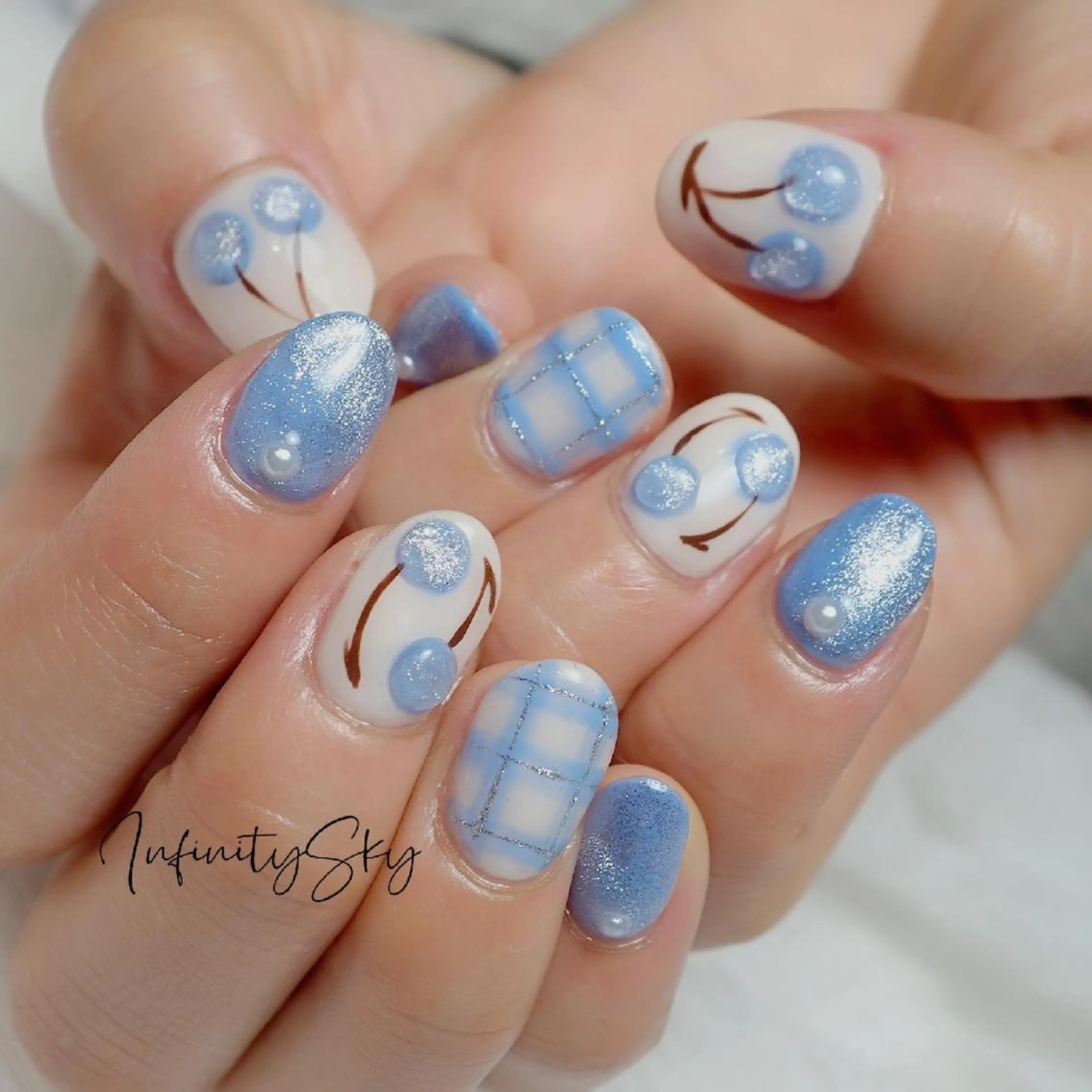 ブルーのさくらんぼネイル｜infinity skyのネイルデザイン