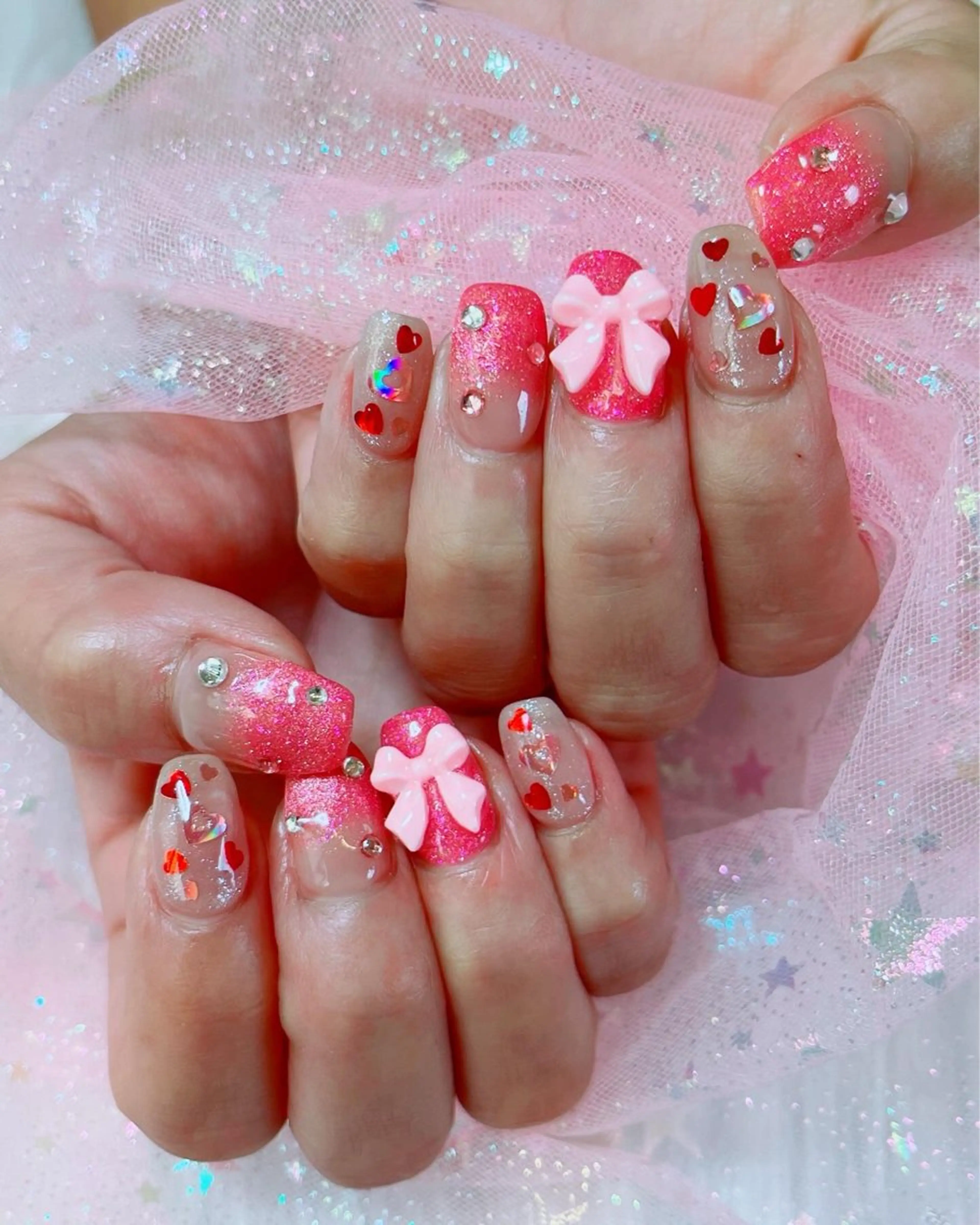 ネイル ハート キラキラネイル ピンク リボン ruirui.naildesign所属・RUI ☆のネイルデザイン