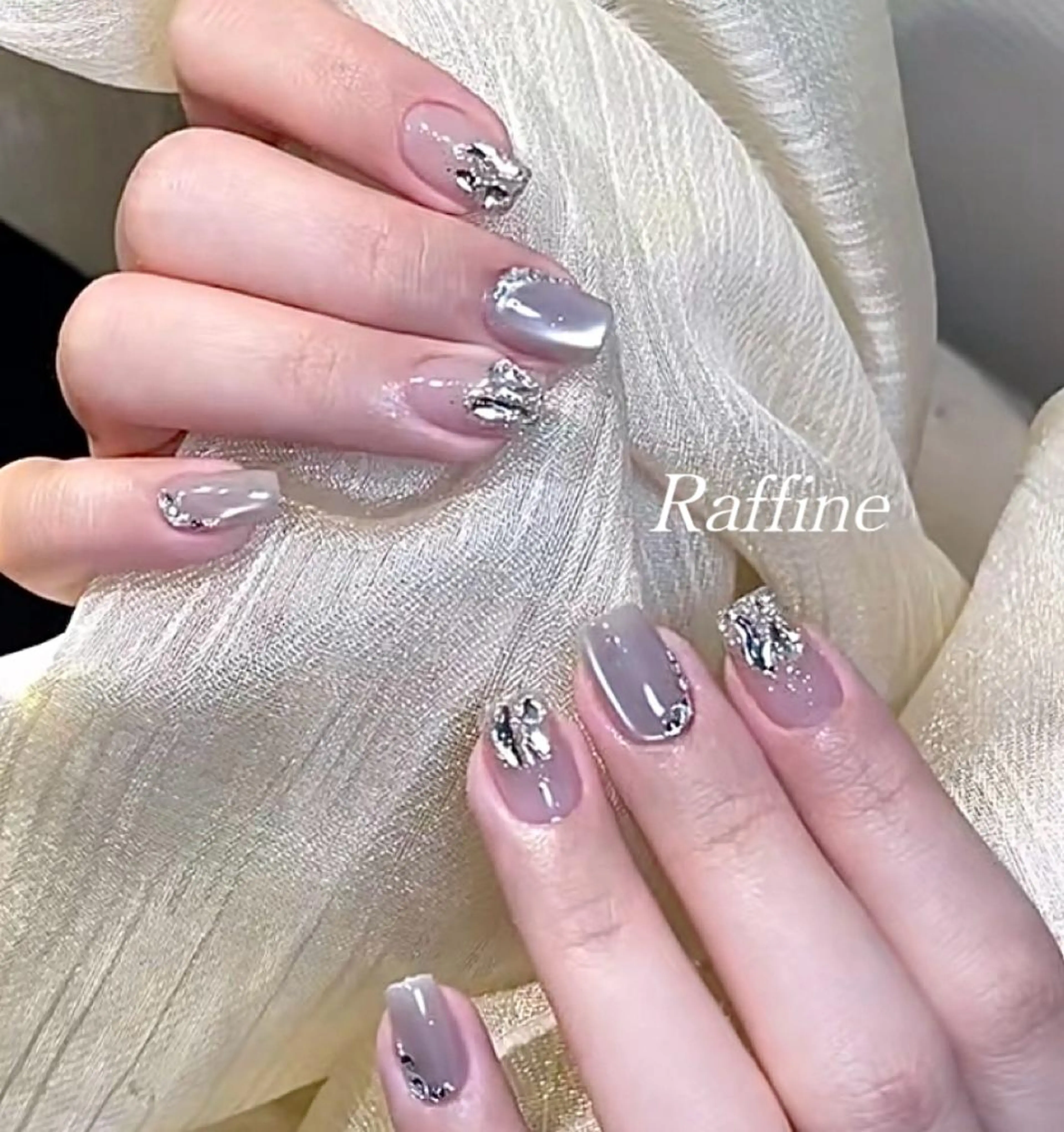 ネイル RAFFINE 月🦋🩵のネイルデザイン