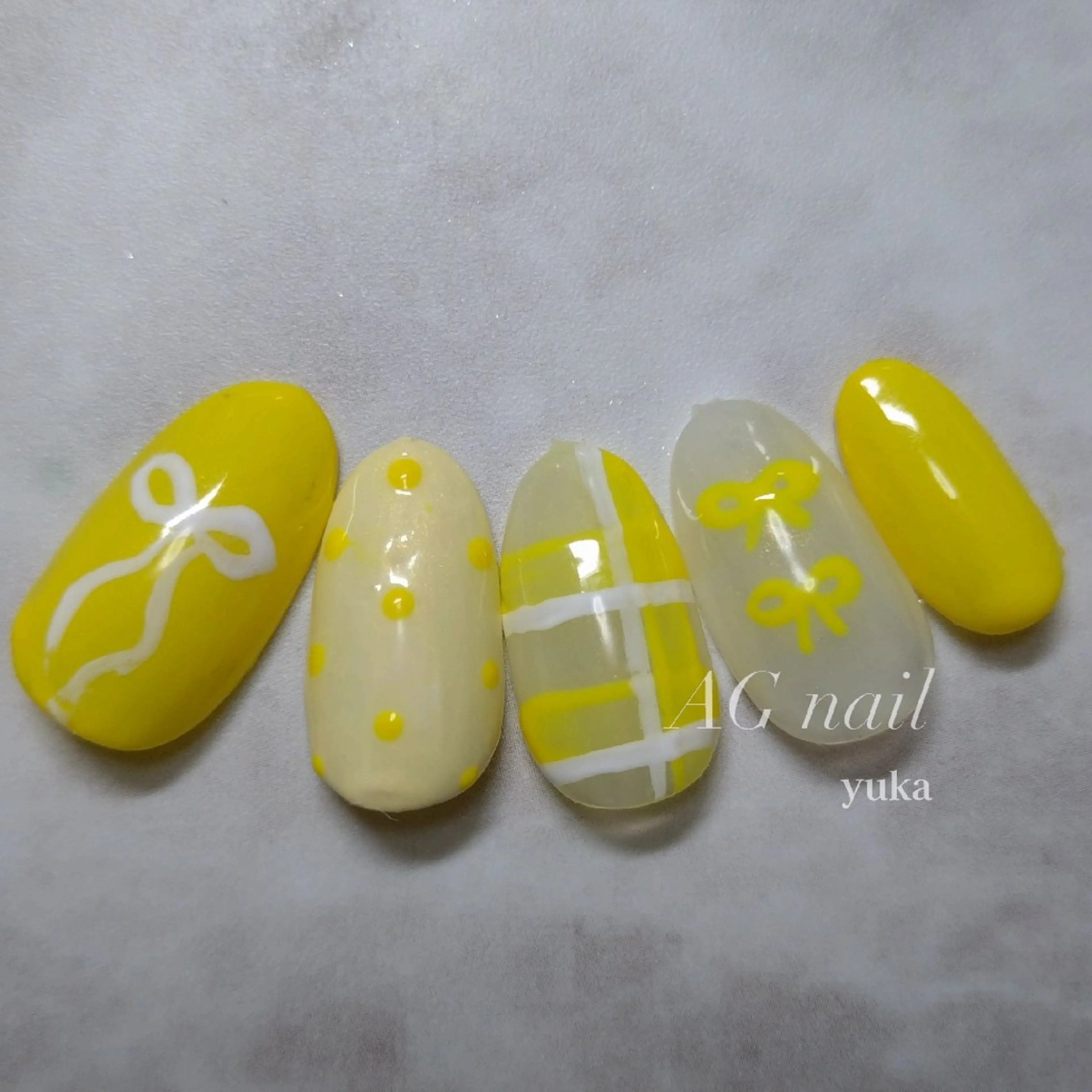 ネイル リボン 黄色 ハンドネイル AG nail 〚　yuka　〛のネイルデザイン