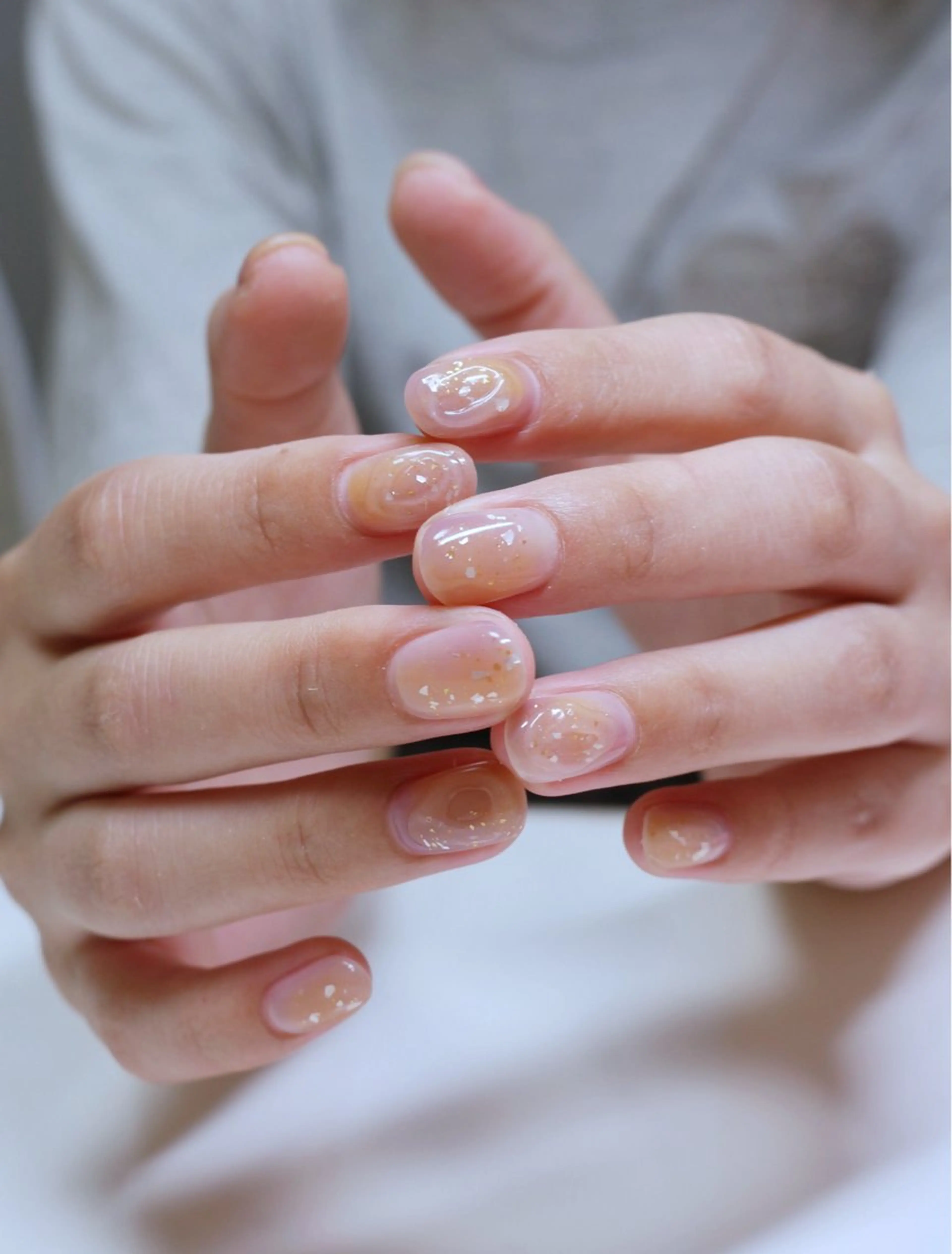 ネイル キラキラネイル ニュアンスネイル オレンジ パープル ワンホンネイル ハンドネイル Baku Nailsのネイルデザイン