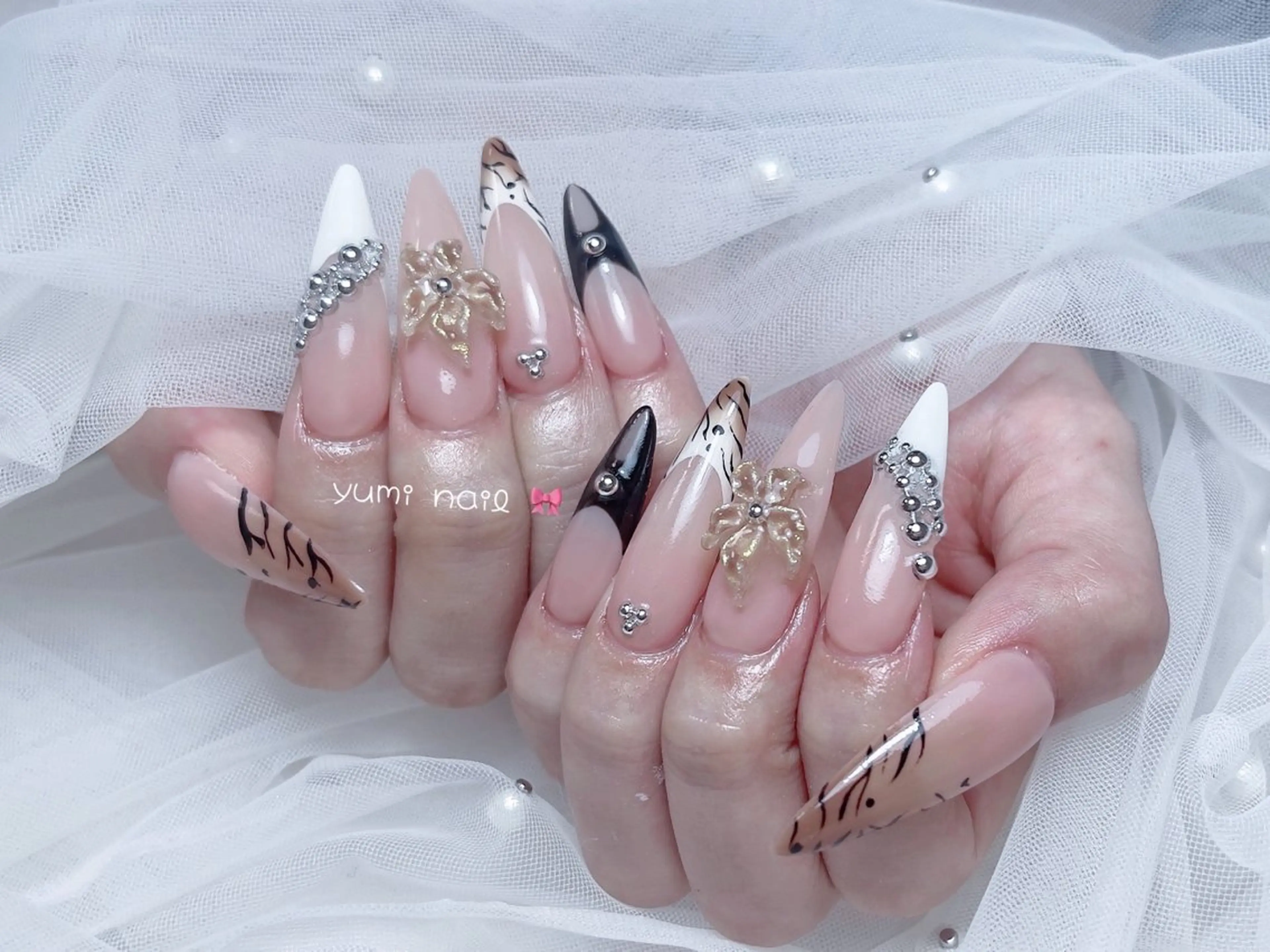 ネイル 𝐲𝐮𝐦𝐢🎀 デザイン長さ出し専門のネイルデザイン