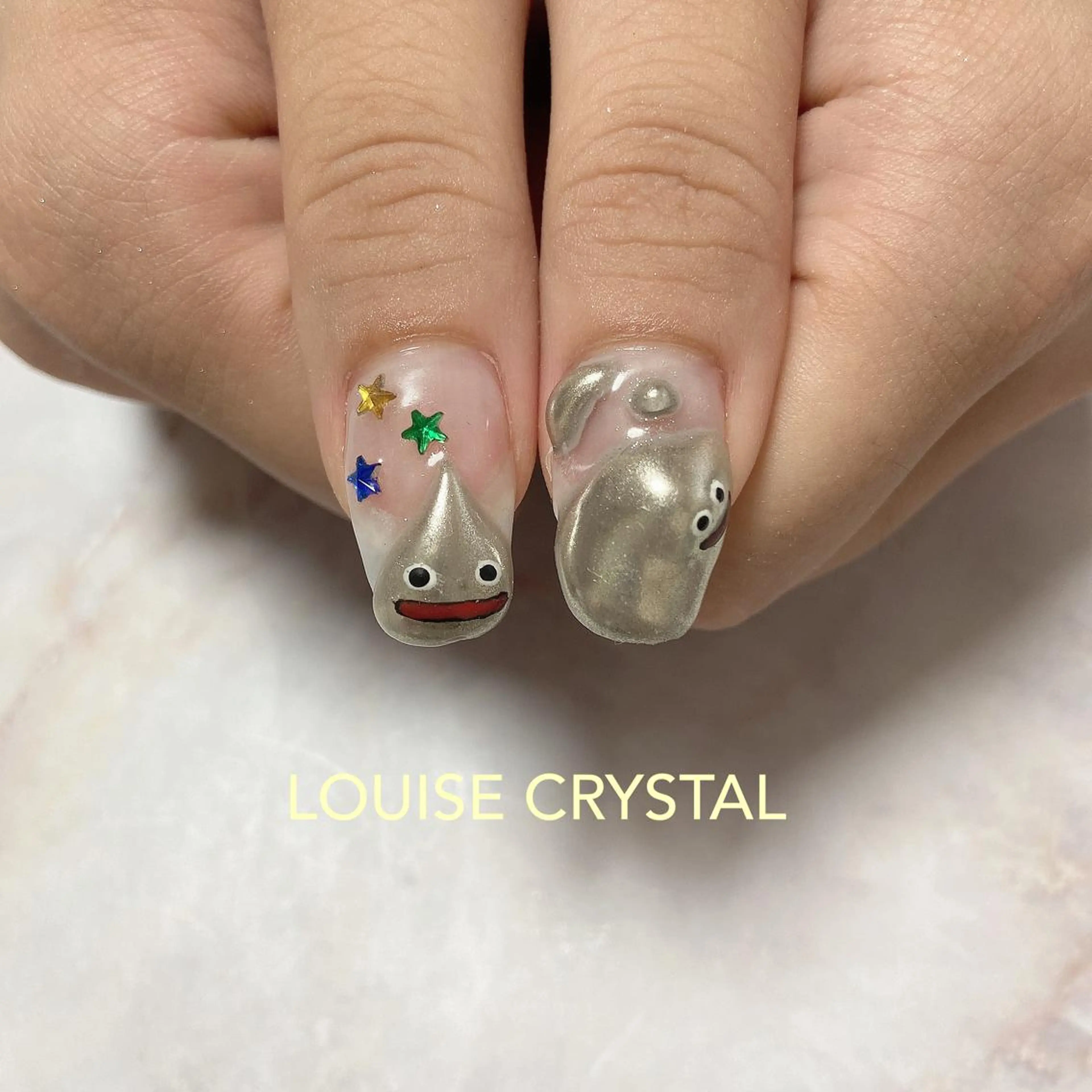 ネイル ハンドネイル LOUISE CRYSTALのネイルデザイン