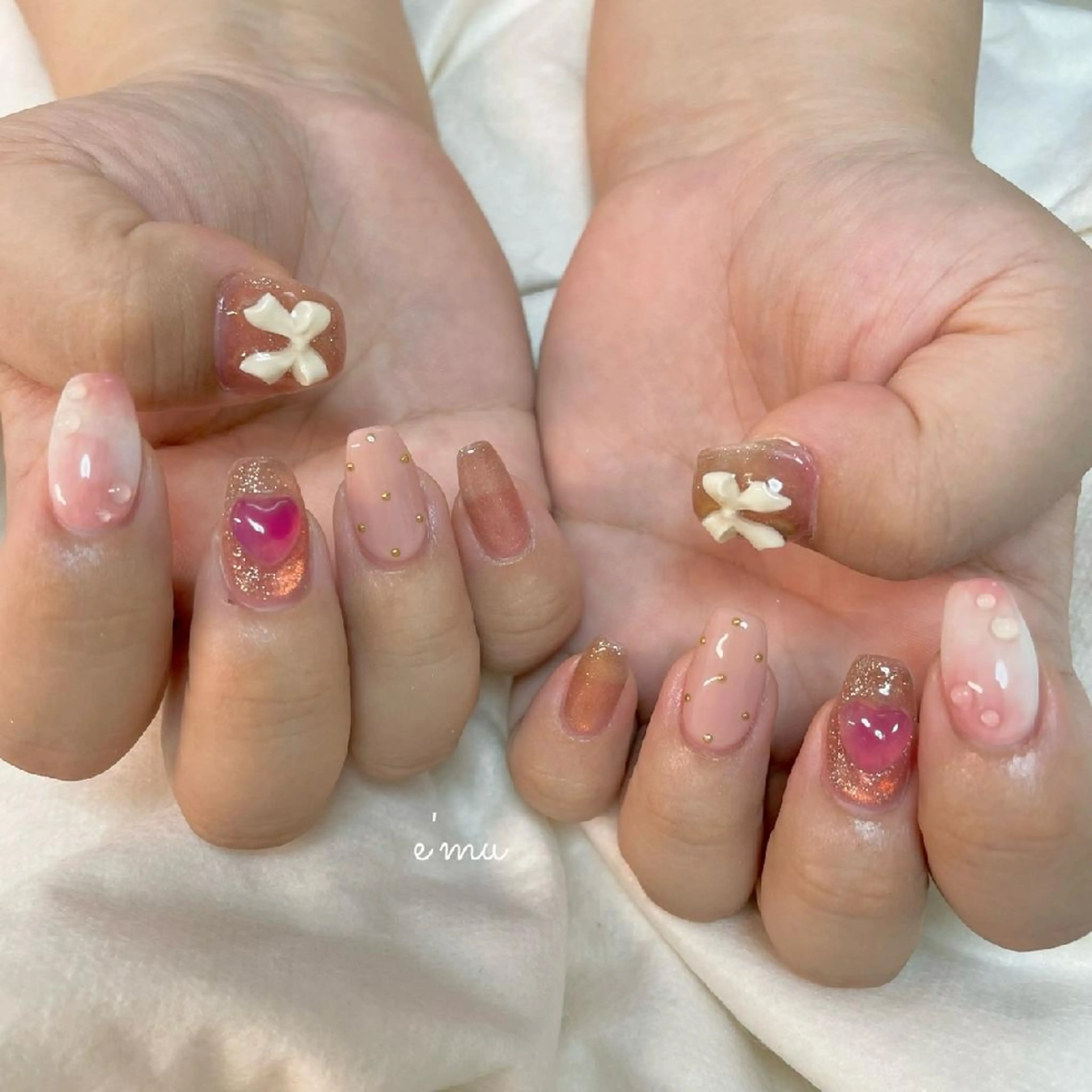 ネイル ガーリー ハート ピンク リボン nail salon e'mu💐のネイルデザイン