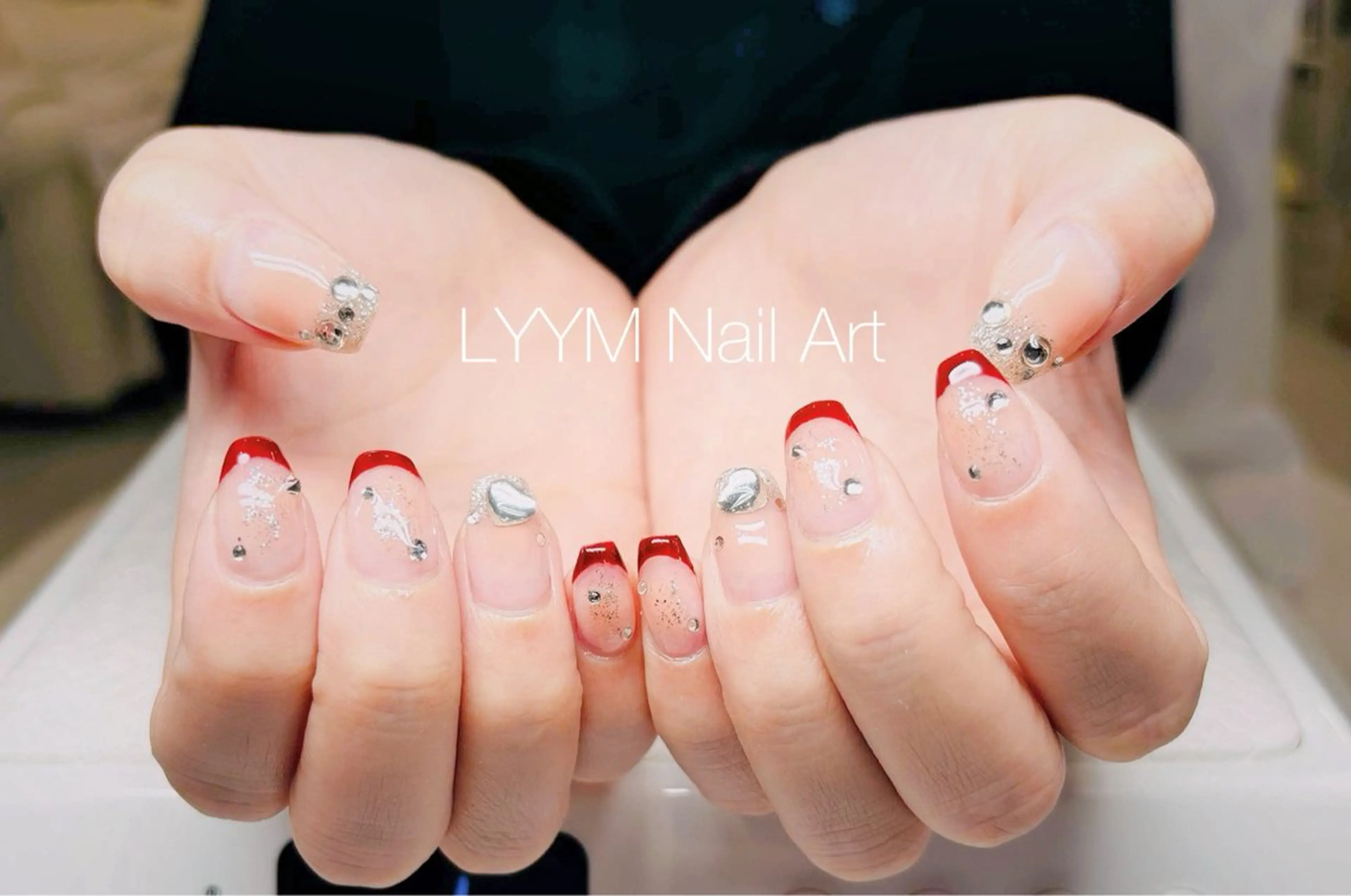 ネイル クリアネイル フレンチネイル ジェルネイル キラキラネイル 赤色 ハンドネイル LYYM Nail Salonのネイルデザイン