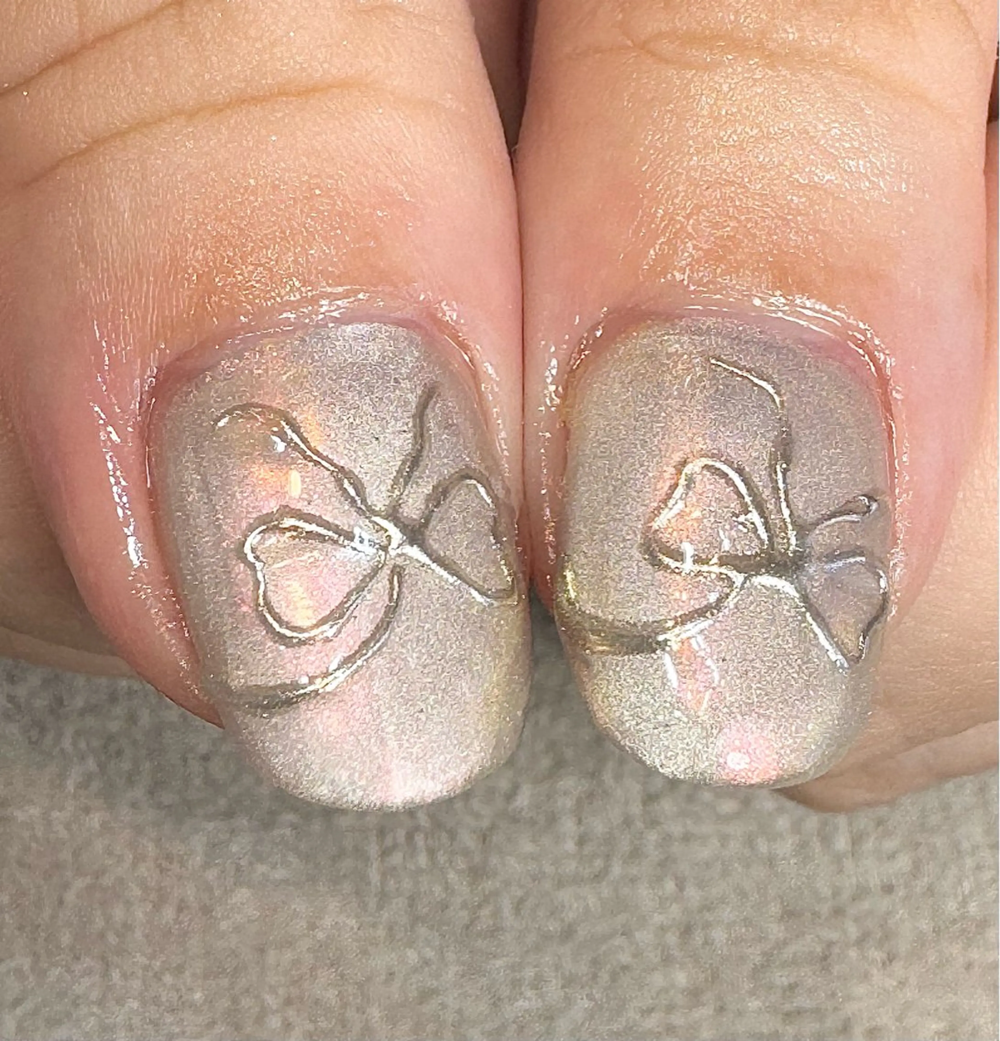 ネイル ミラーネイル リボン LinoTino nailのネイルデザイン