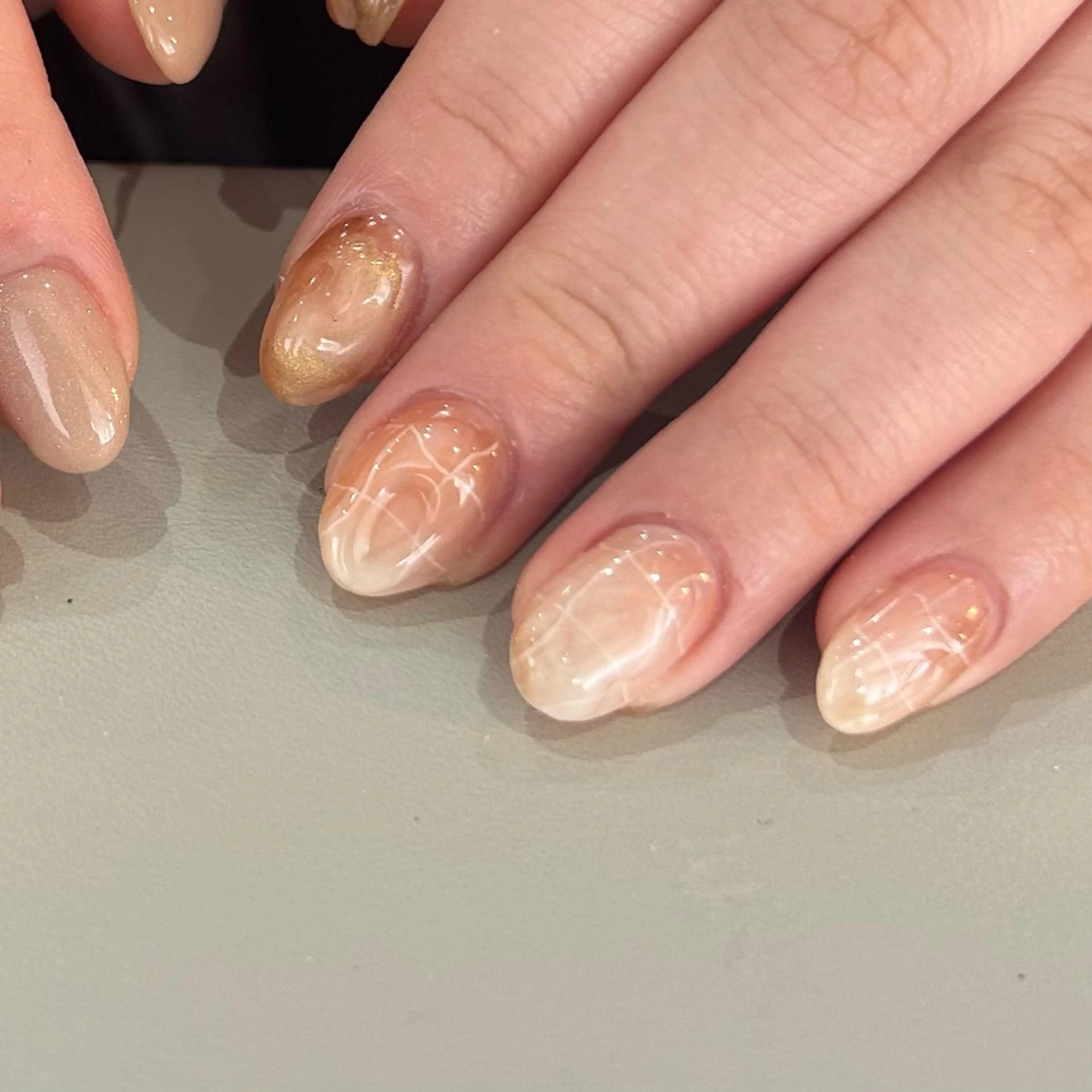 ネイル ニュアンスネイル オレンジ Etel atelier.のネイルデザイン