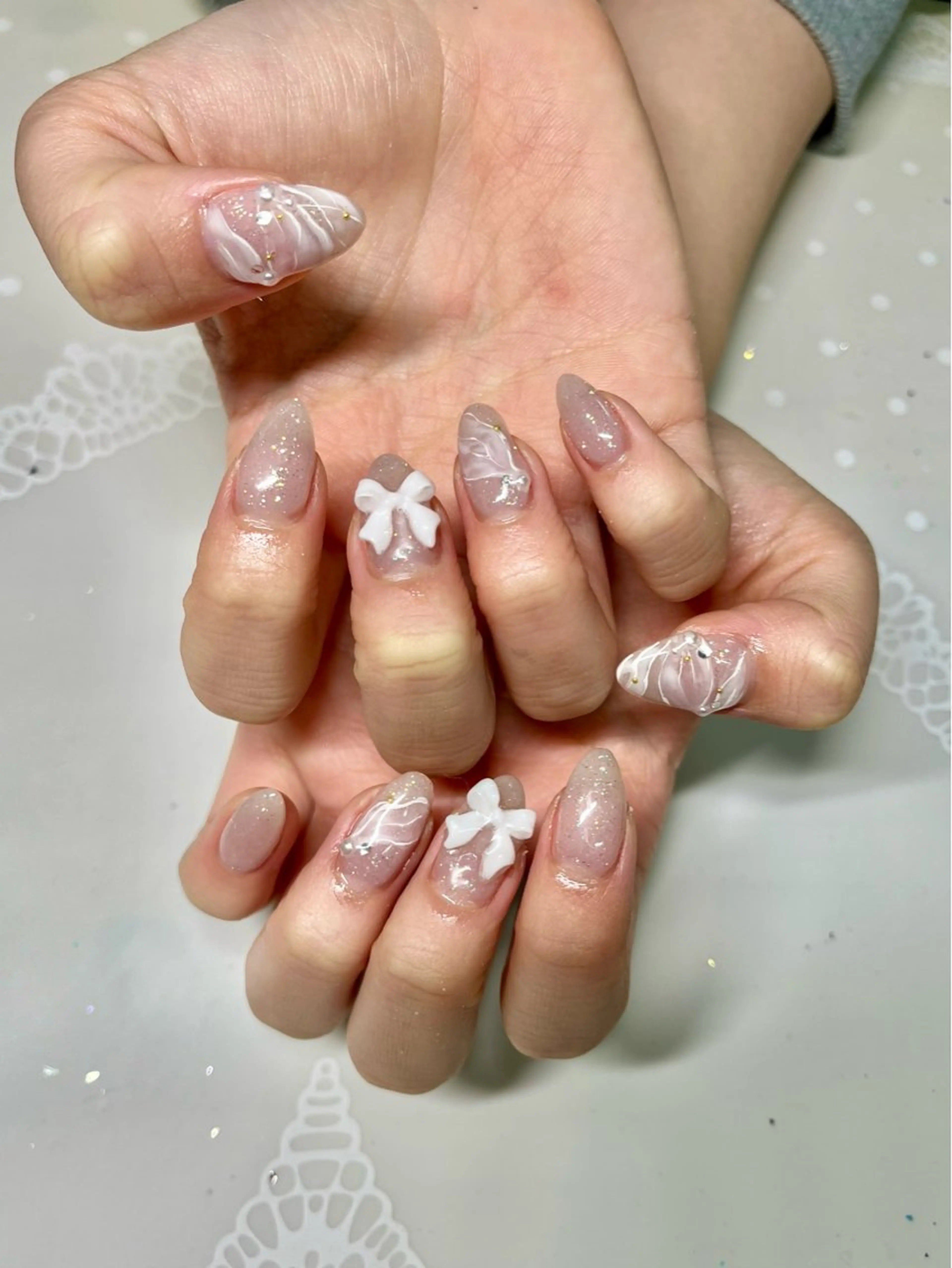 ネイル リボン ハンドネイル 新宿ネイルサロン ジェミディローサ所属・新宿ネイルサロン ジェミディローサのネイルデザイン