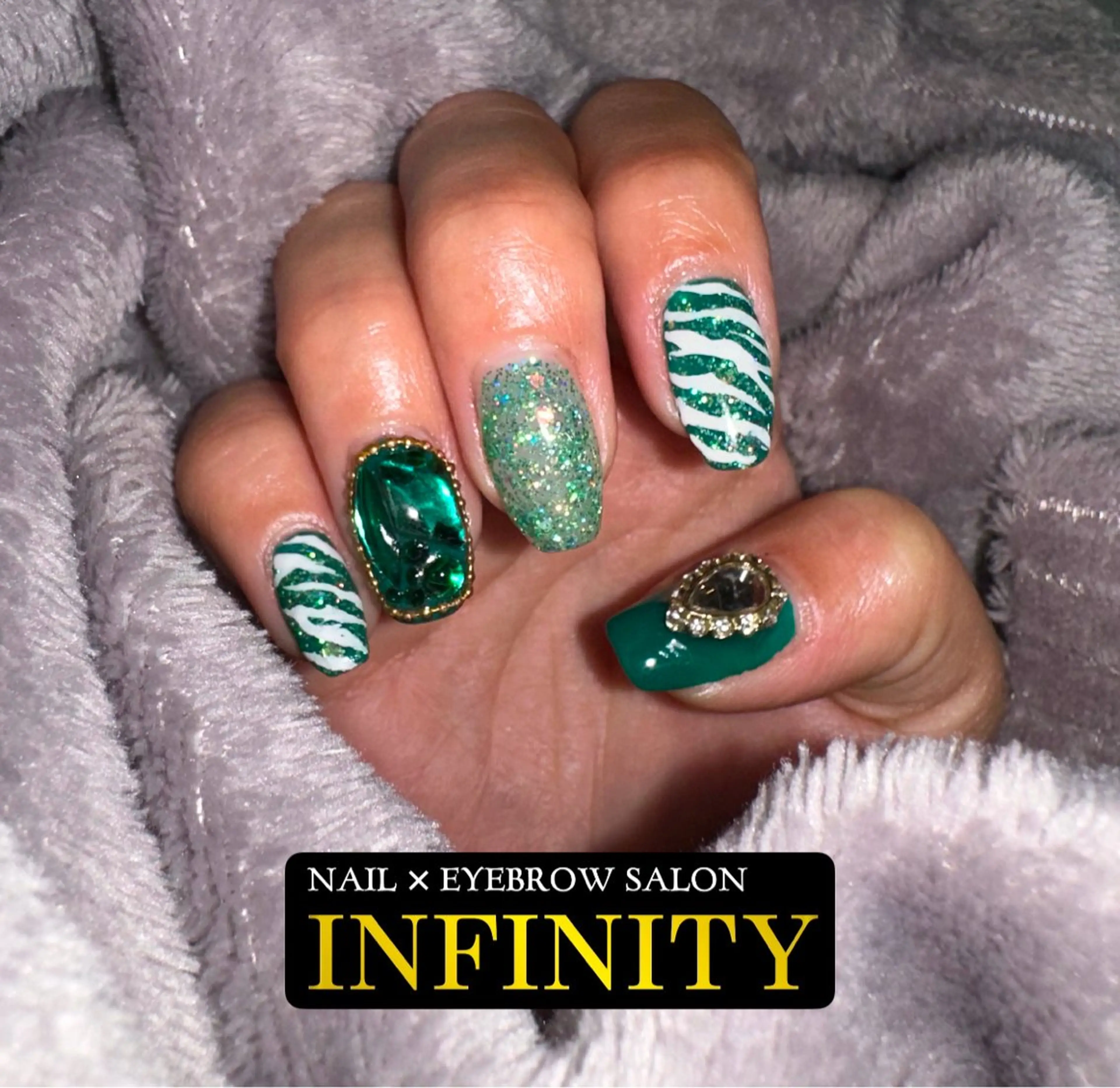 ネイル アニマル柄 INFINITY所属・INFINITY 💎のネイルデザイン