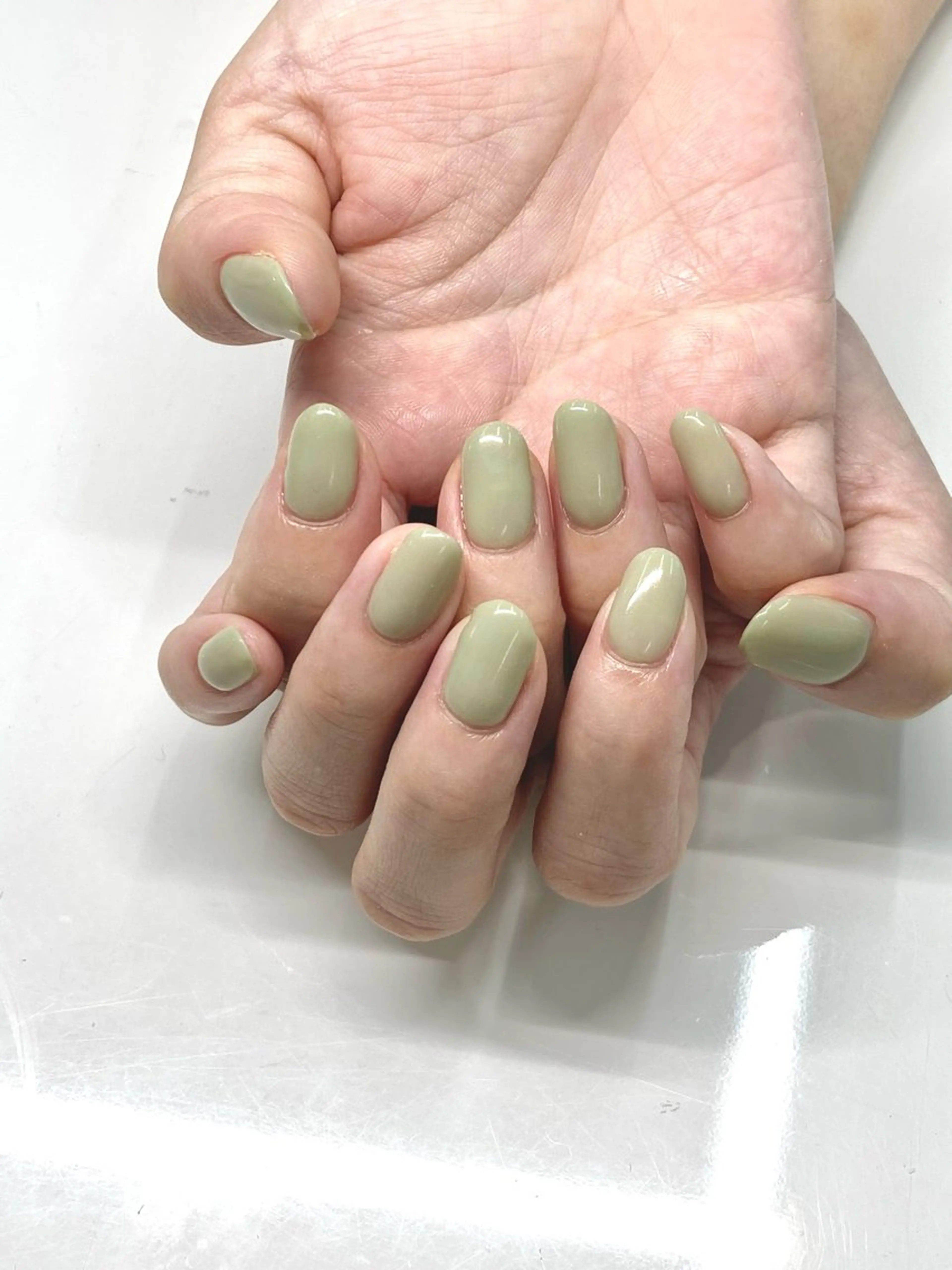 ネイル グリーン ワンカラーネイル Nail Total beauty salon Laki所属・佐々木 優花のネイルデザイン