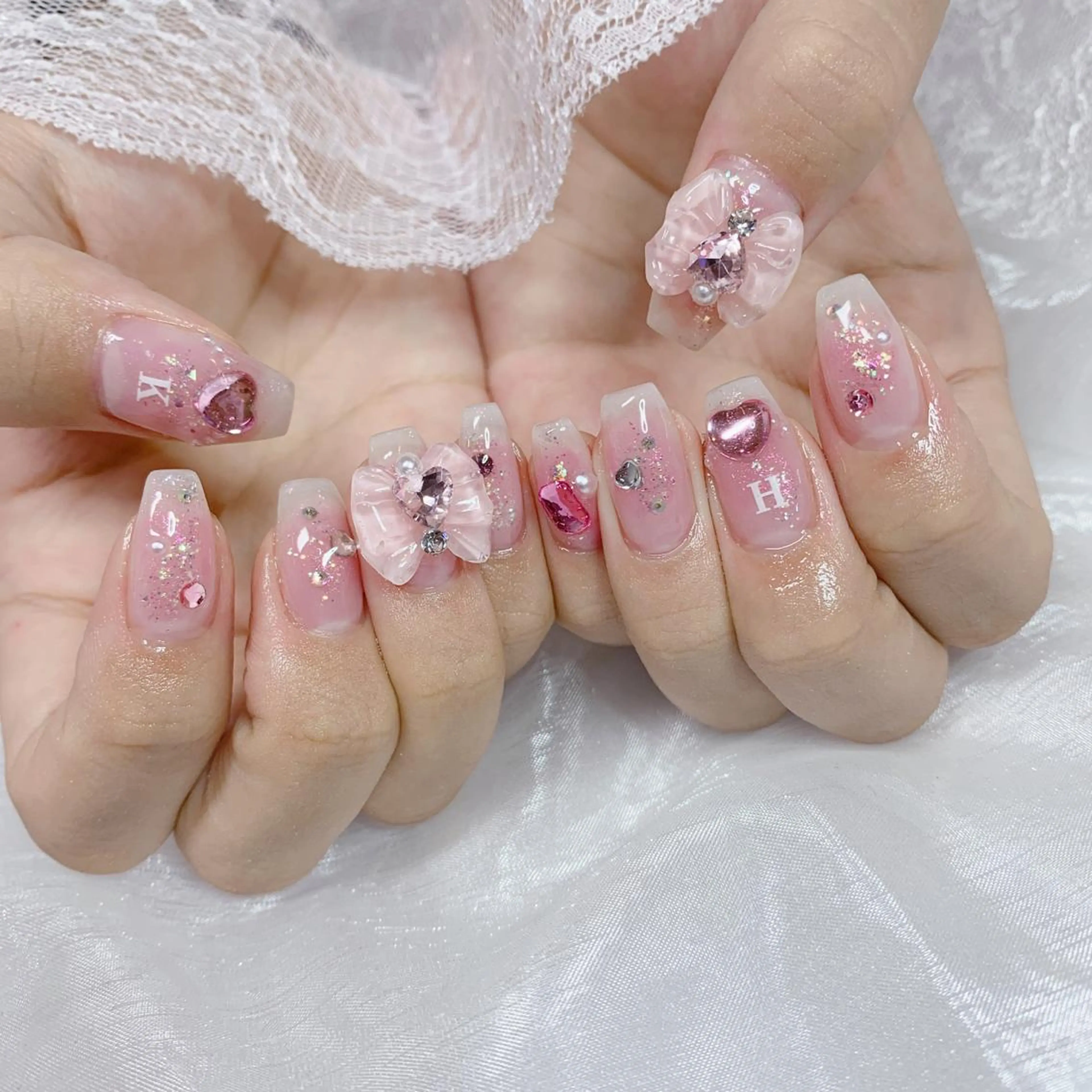 ネイル リボン ハンドネイル La neige* yuki 🥯🍑のネイルデザイン