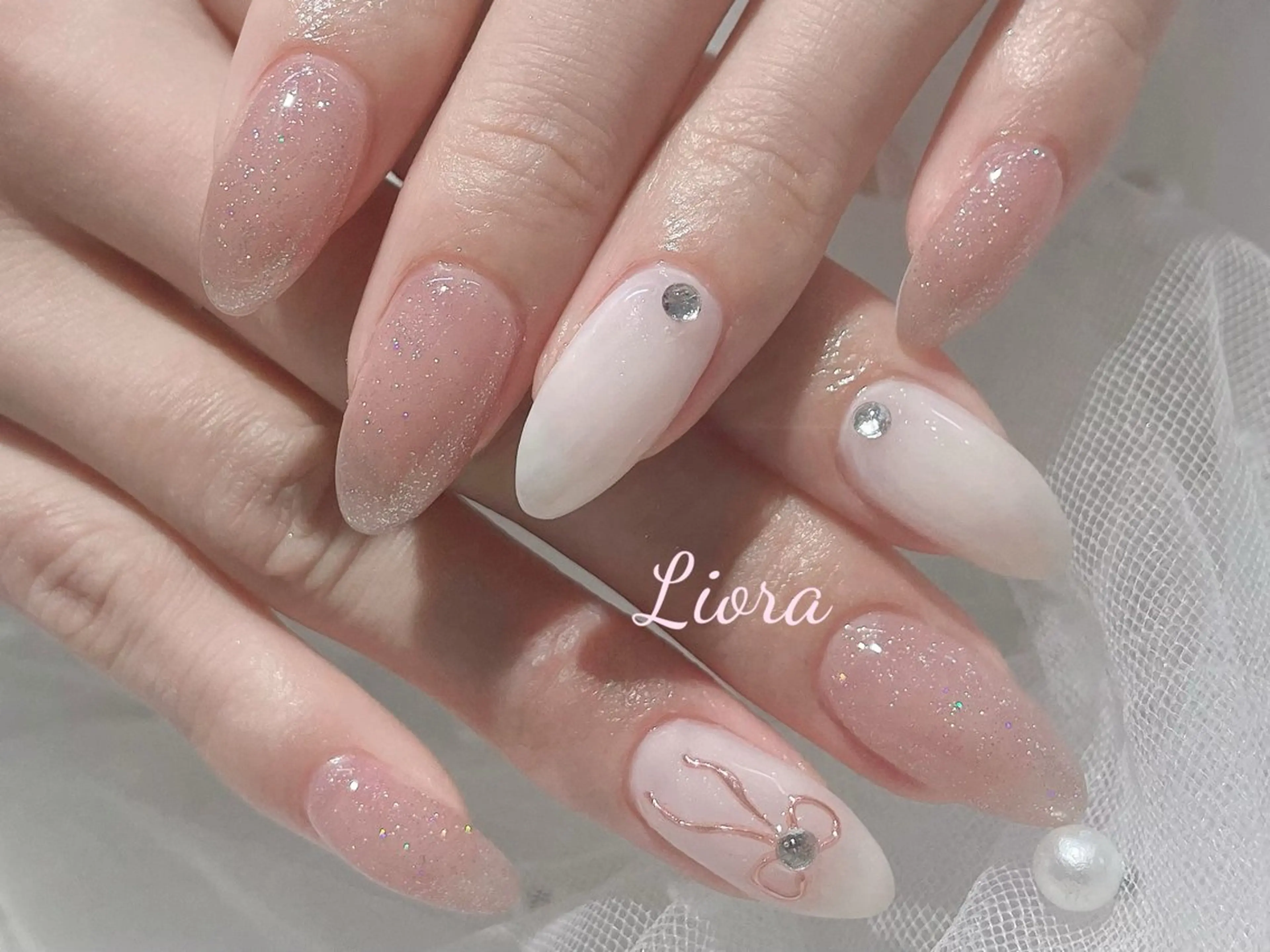 ネイル フレンチネイル ジェルネイル ガーリー グラデーション キラキラネイル Liora ネイルサロン所属・Liora nail salonのネイルデザイン