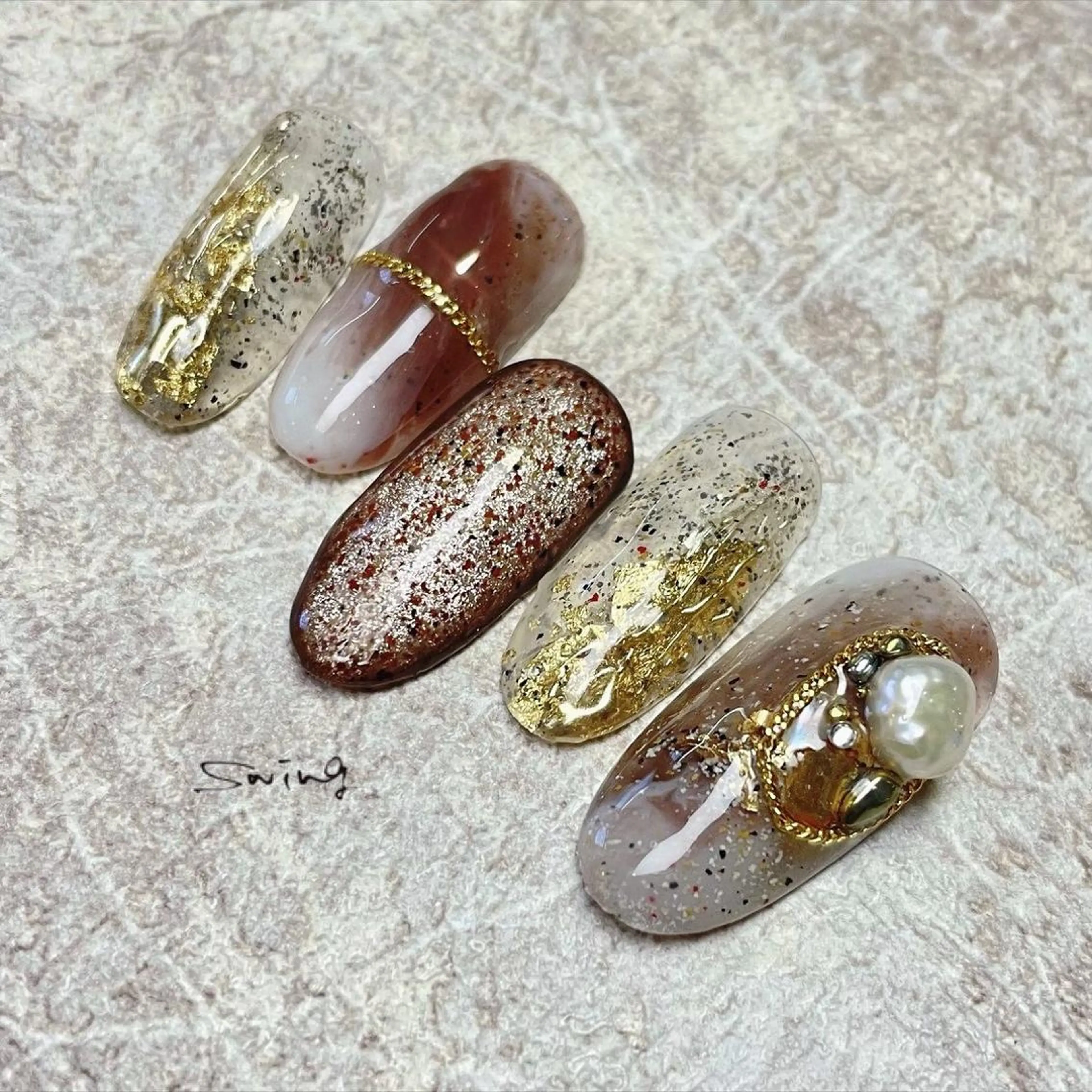 ネイル ストーンネイル SWING Nail Salon所属・Yoshida Takakoのネイルデザイン