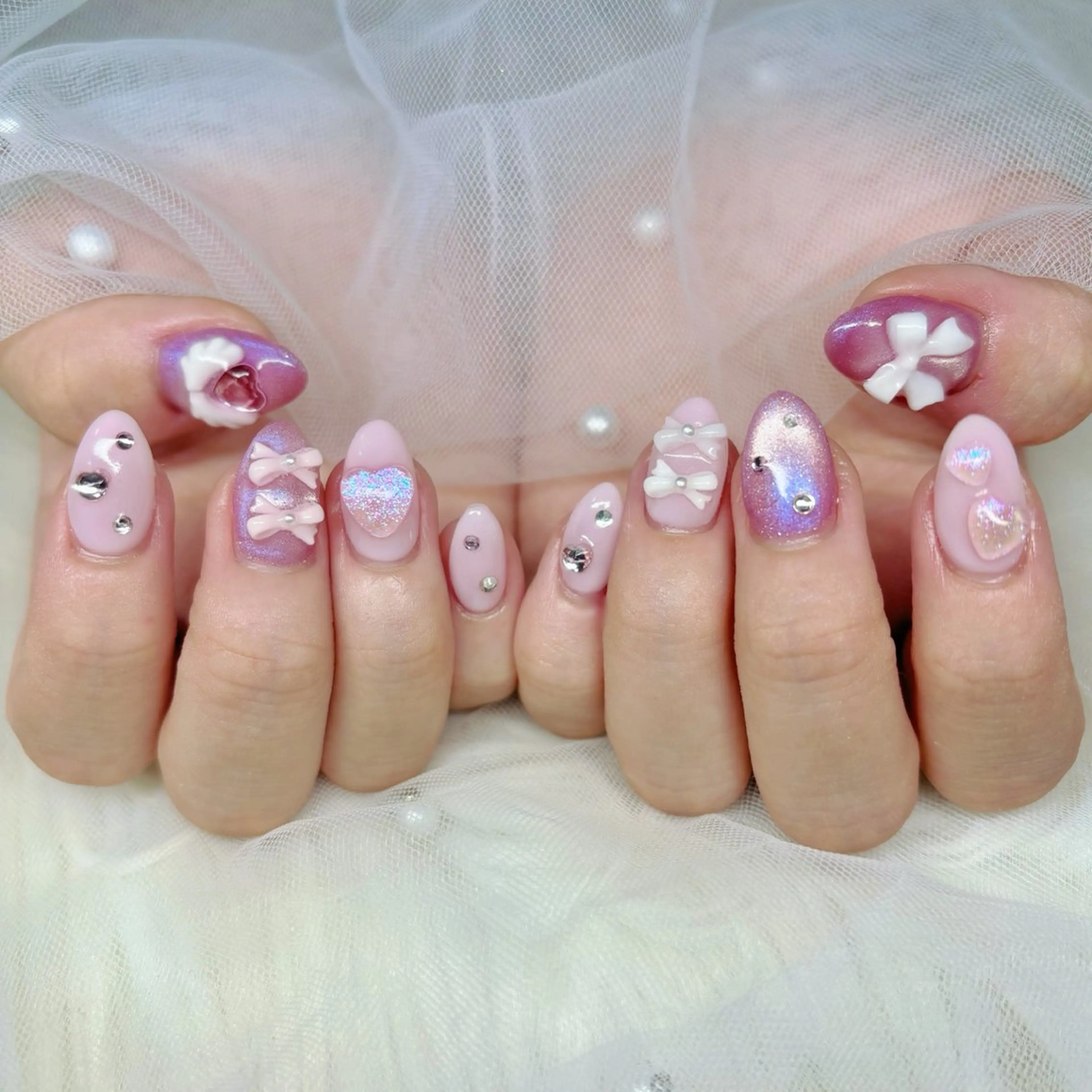ネイル ガーリー ピンク ハンドネイル Yuna🩵 RE:N.Nailのネイルデザイン
