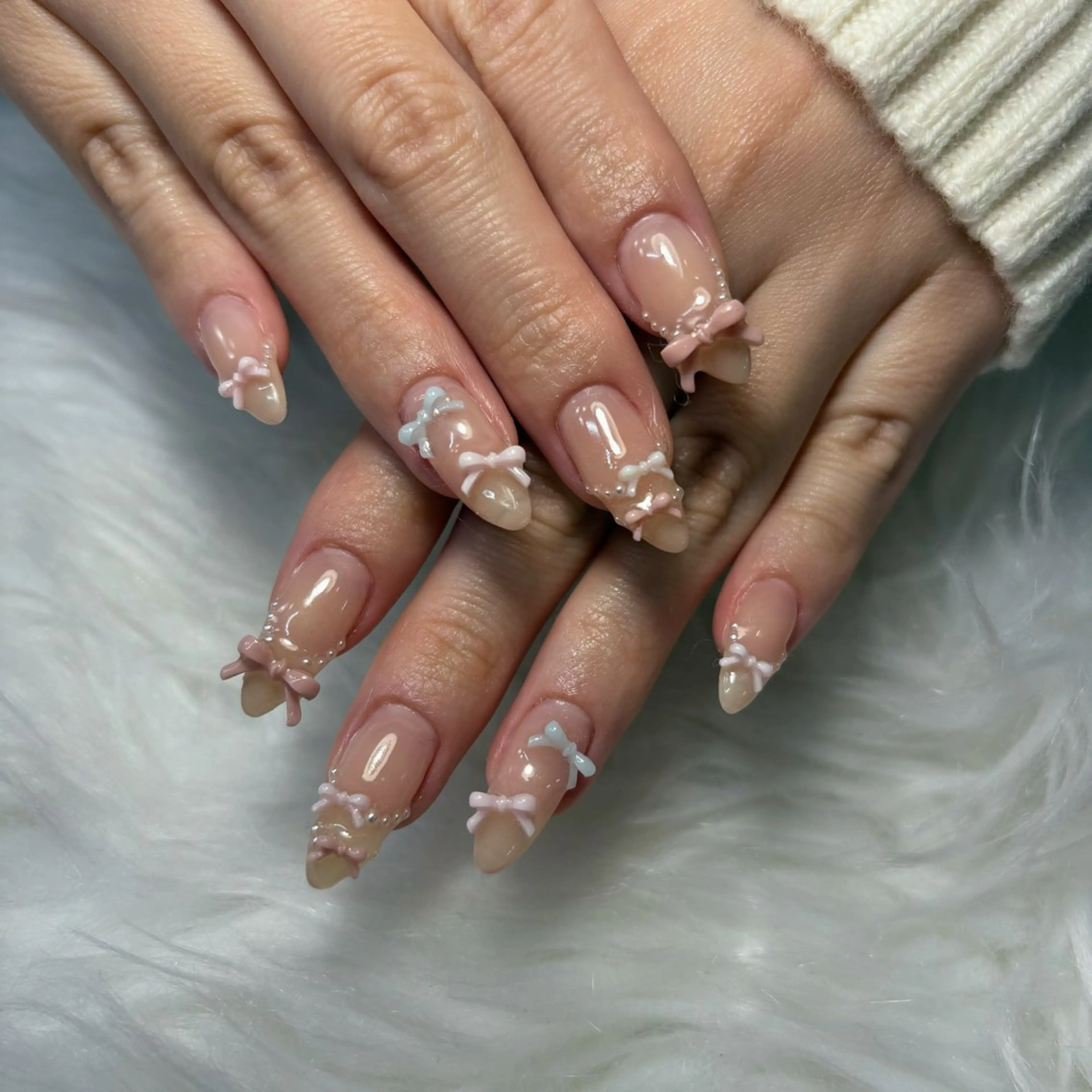 ネイル リボン ハンドネイル ハンドケア makana nail所属・makananail anjyuのネイルデザイン