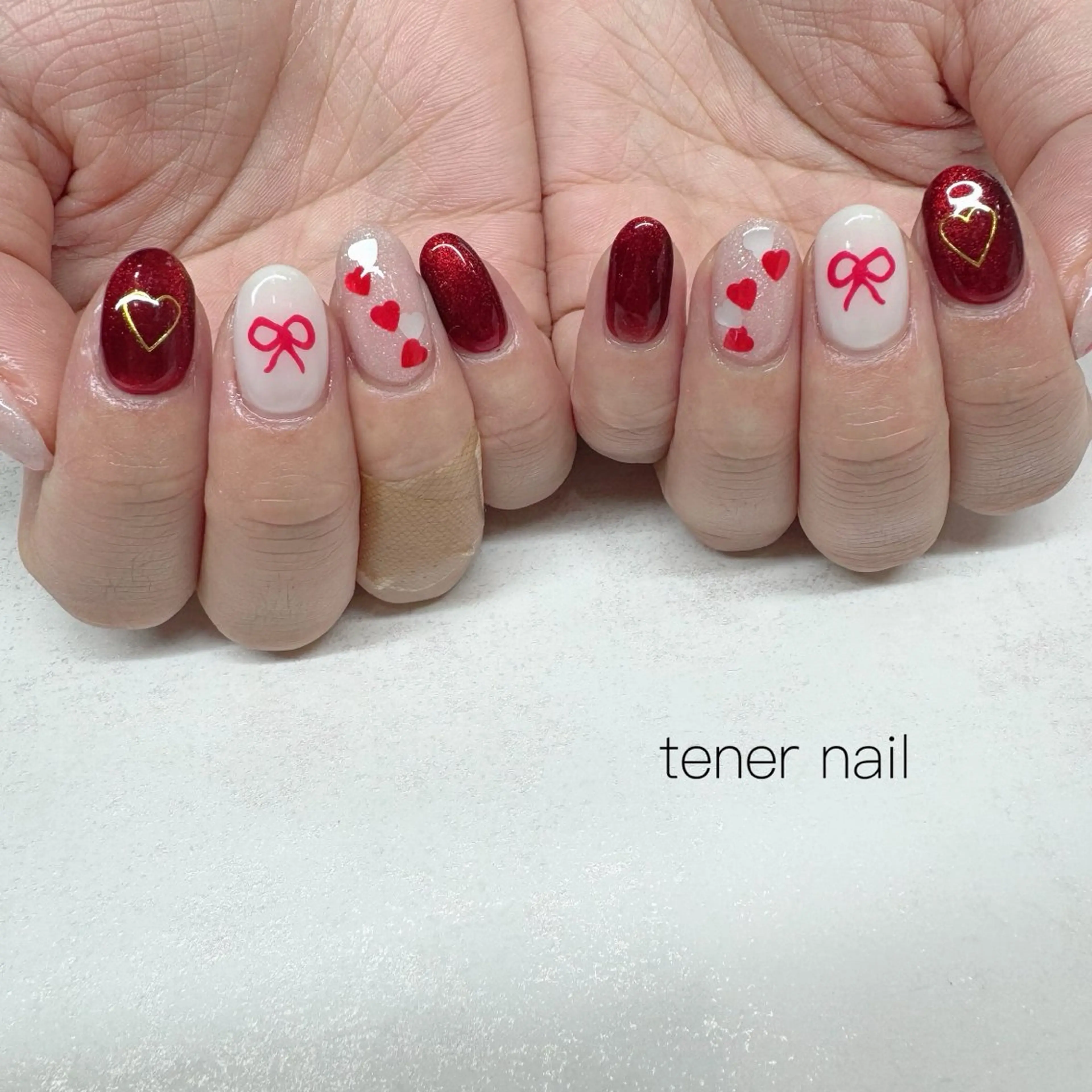 ネイル ハート リボン ハンドネイル tener  nail  テネルネイル所属・テネルネイル tener nailのネイルデザイン