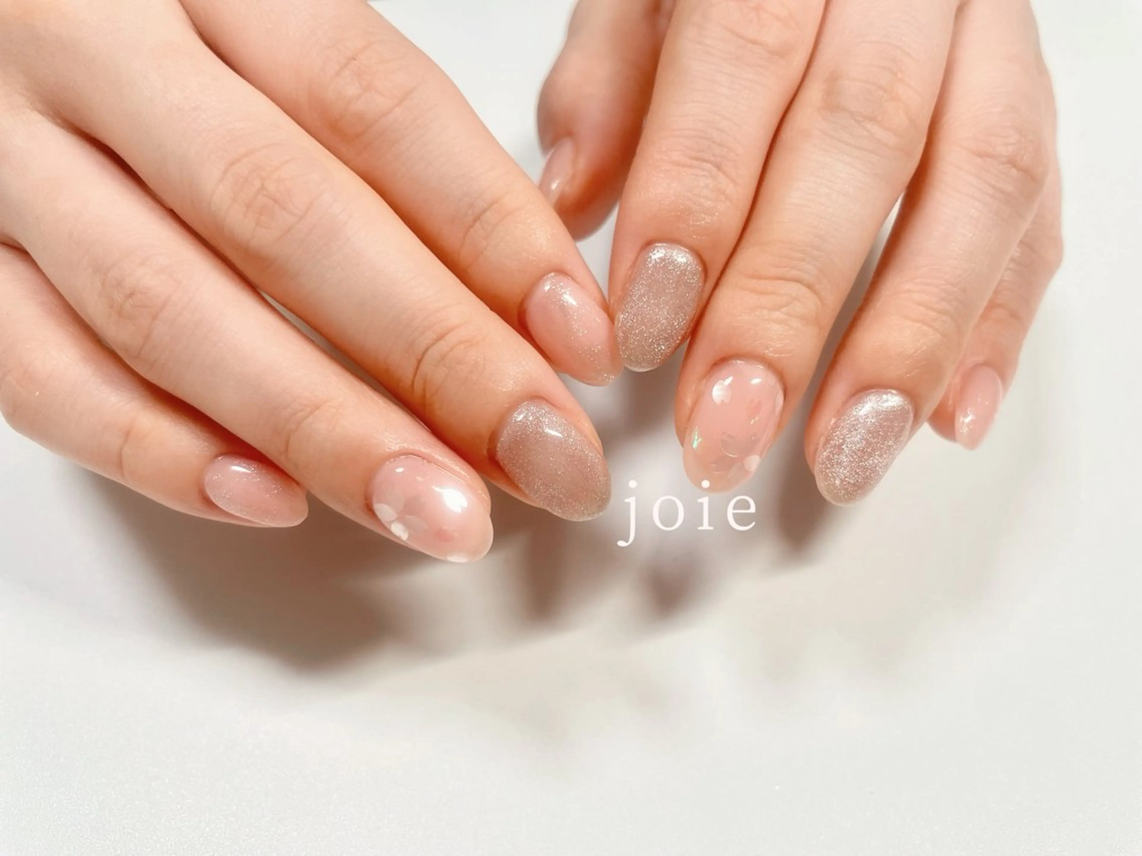 ネイル 桜ネイル キラキラネイル ニュアンスネイル オフィスネイル 春ネイル Jr.nailist Mikuのネイルデザイン