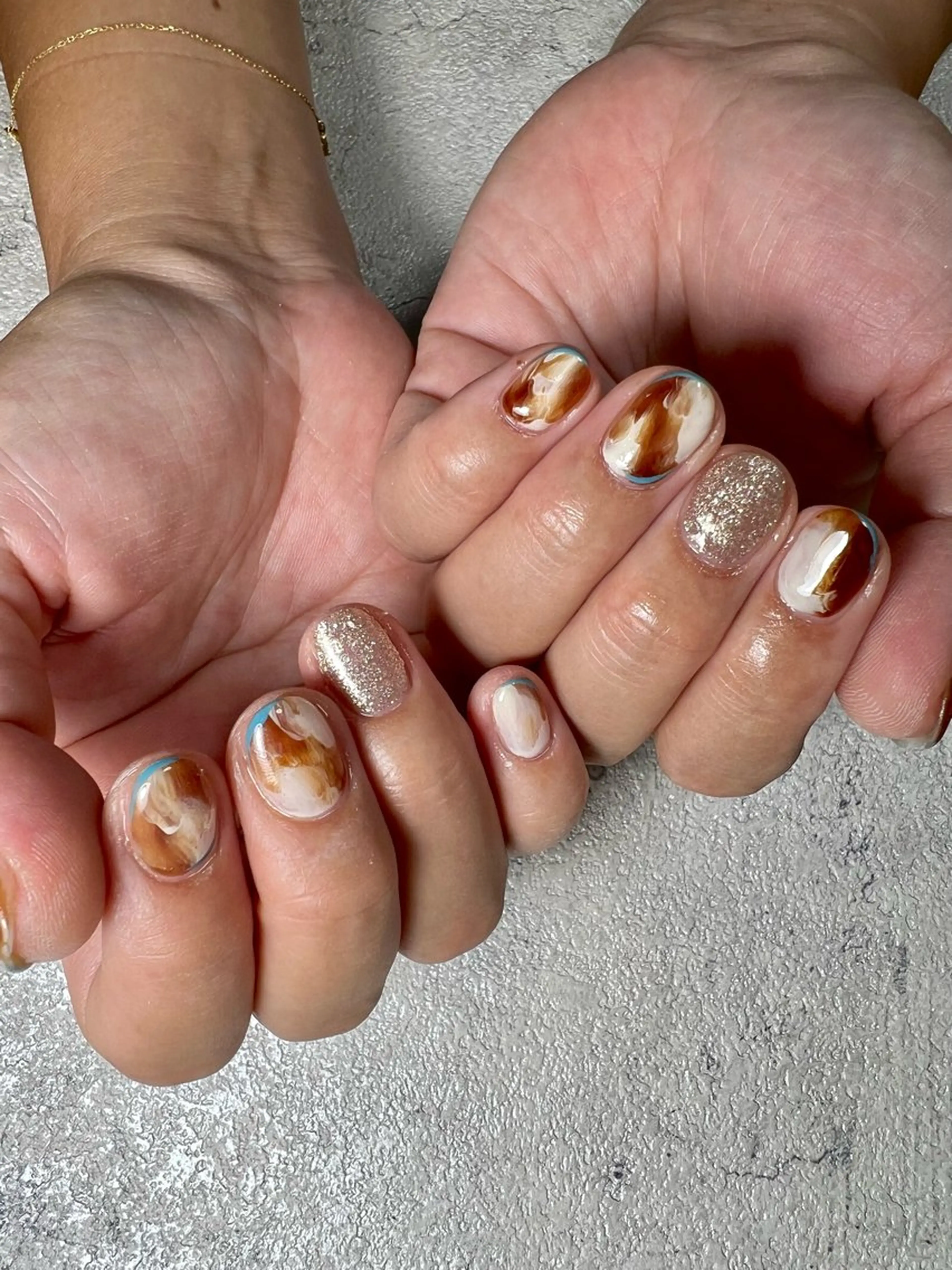 ネイル ブラウン ジェルネイル ラメ(グリッター) 持ち込み ニュアンスネイル flowers nailのネイルデザイン