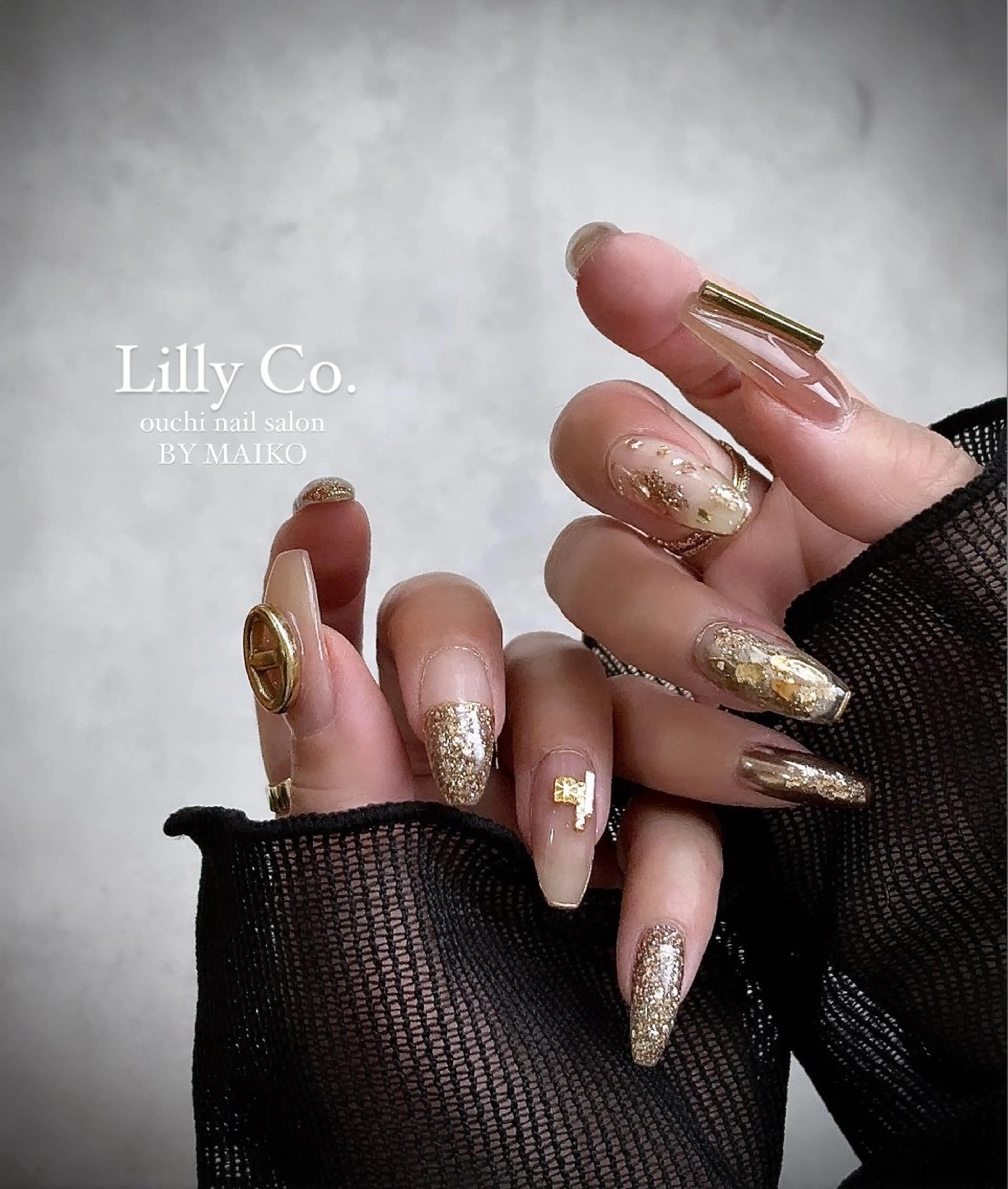 ネイル ゴールド ハンドネイル ハンドケア Lilly Co.のネイルデザイン